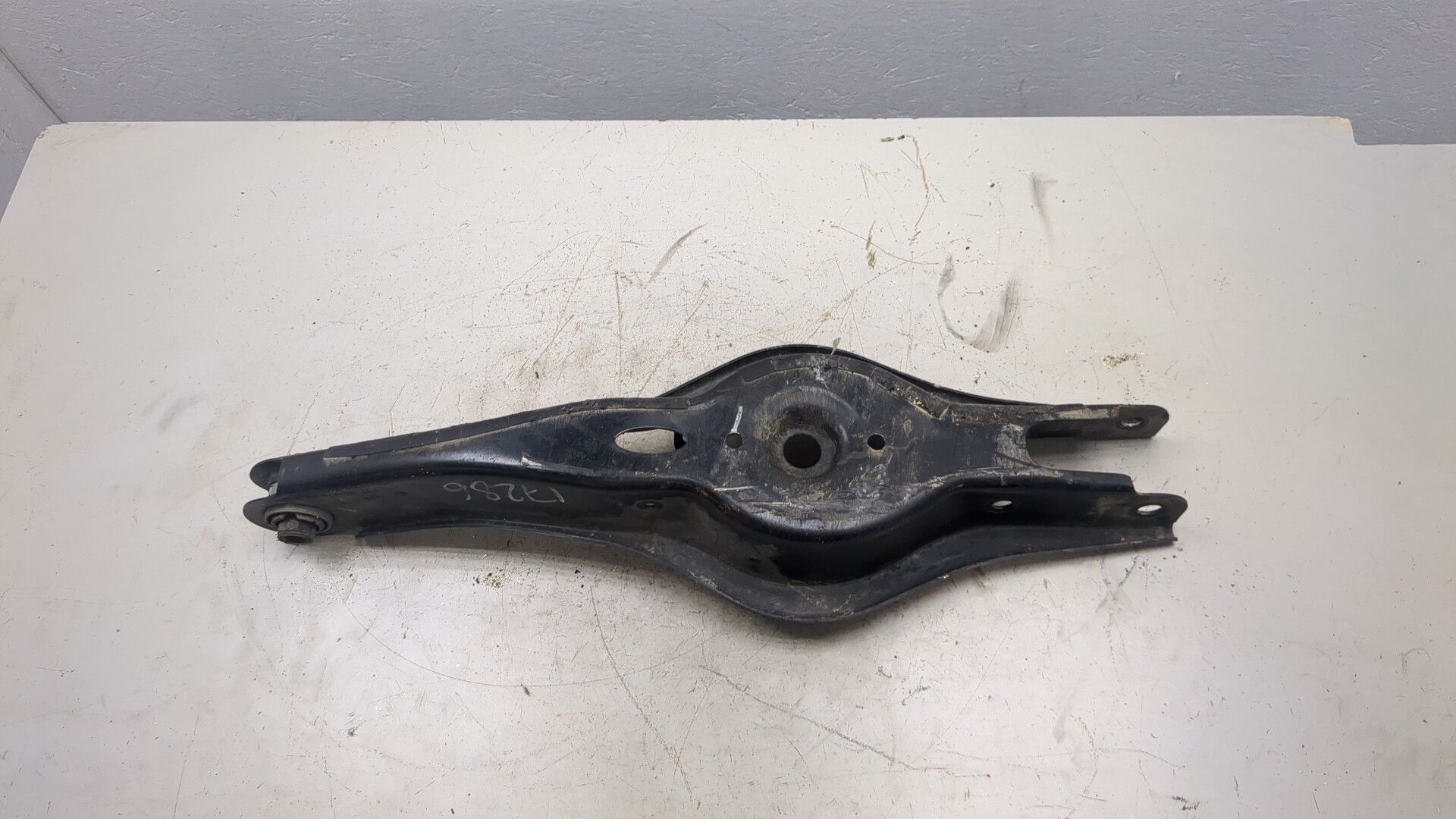 Рычаг задний