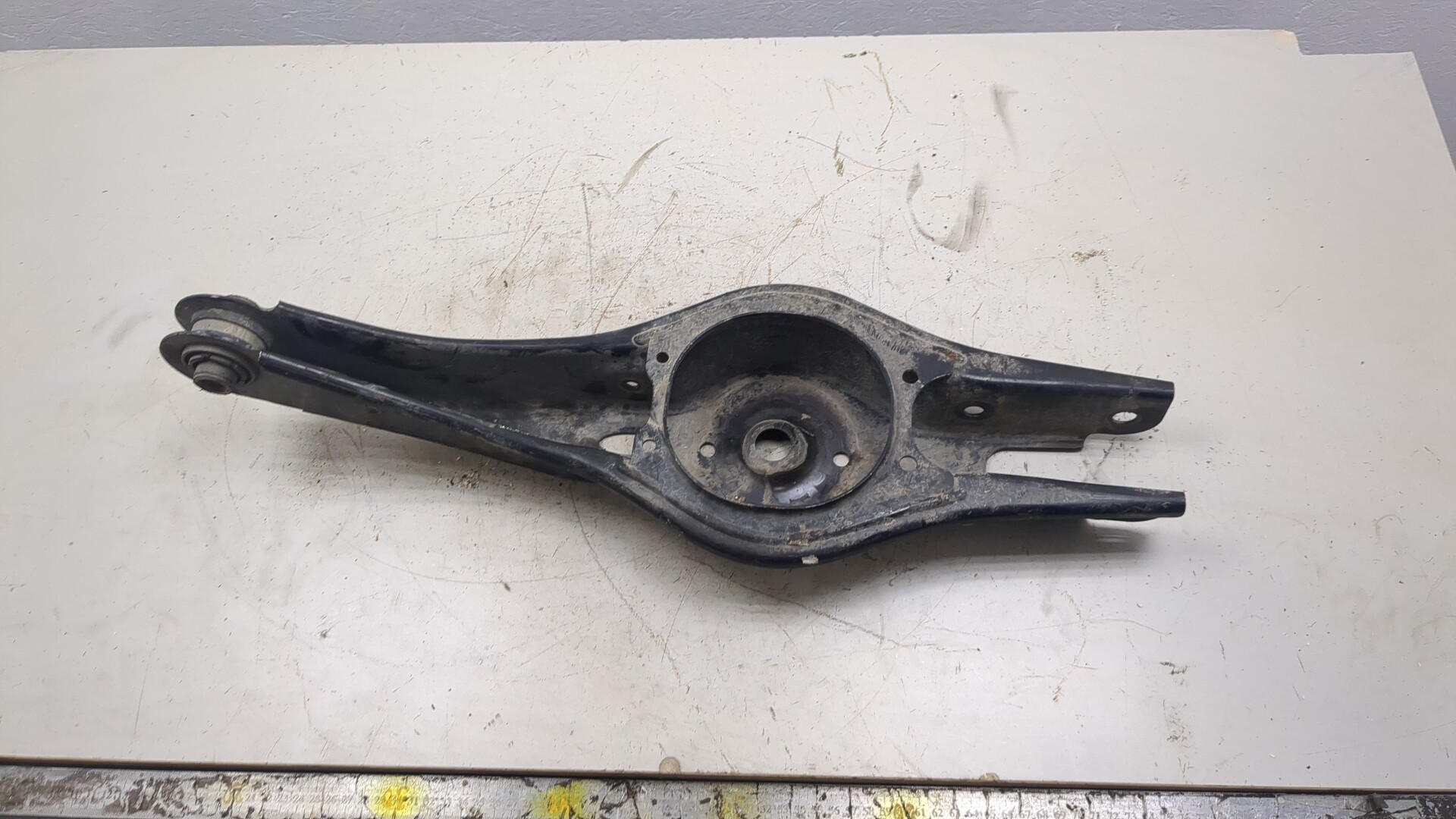 Рычаг задний