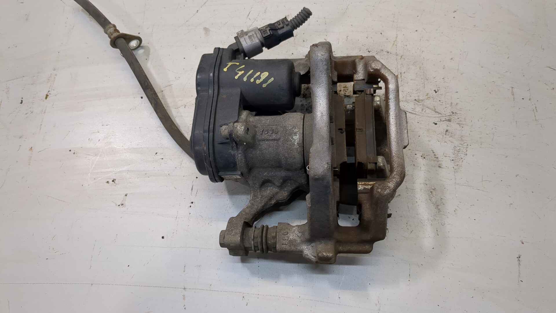 Суппорт задний левый