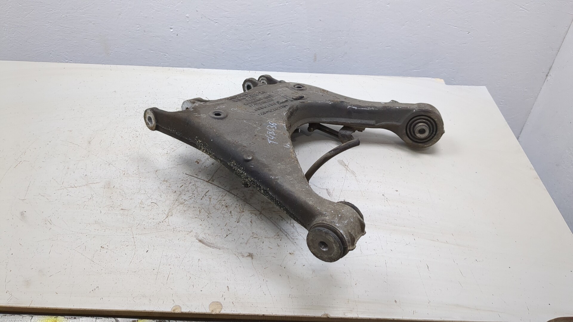 Рычаг задний левый