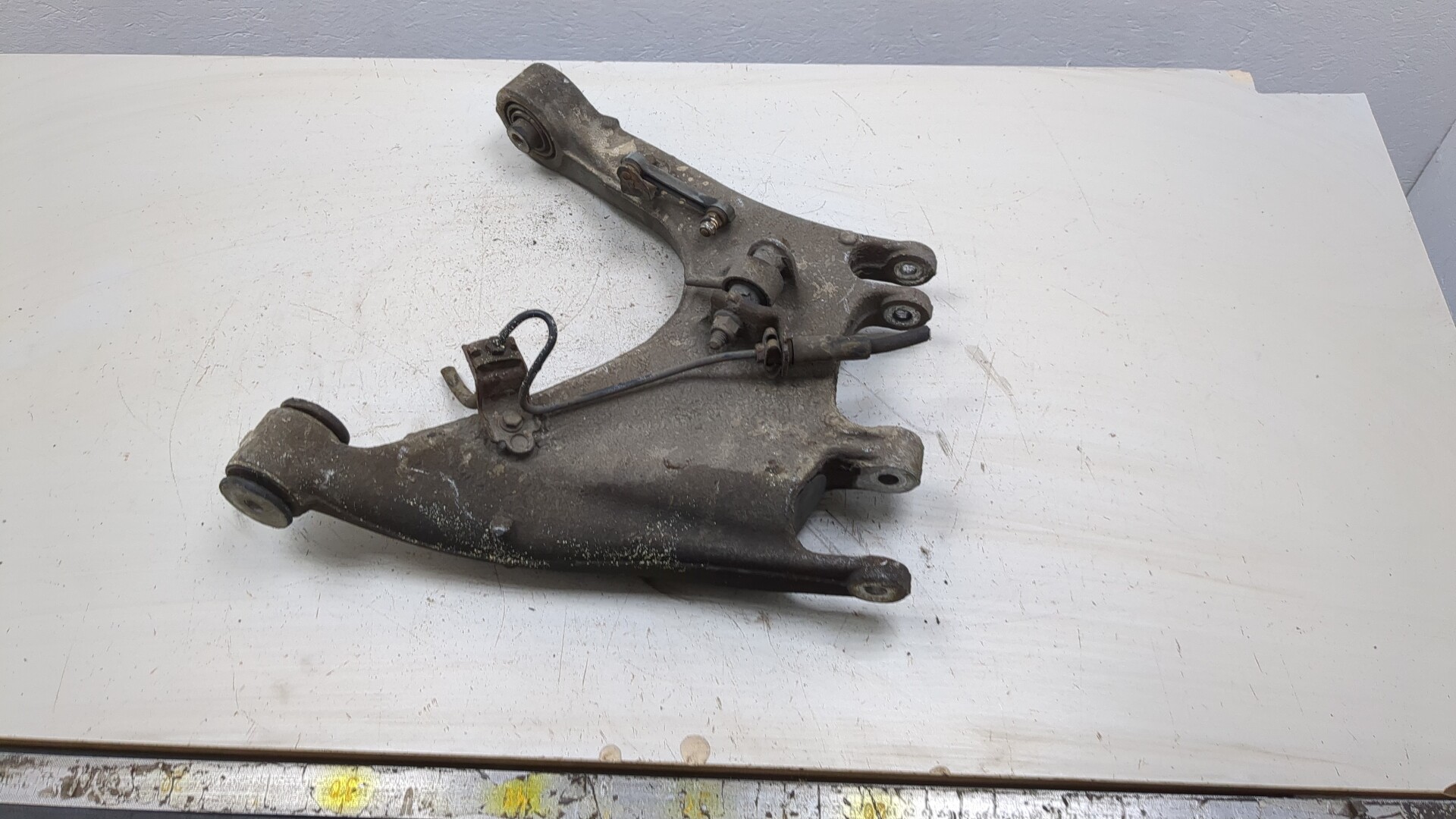 Рычаг задний левый