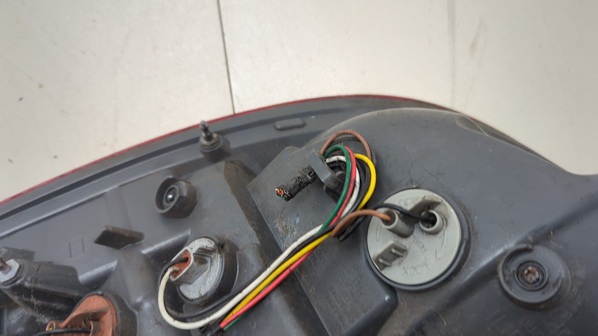 Фонарь задний левый