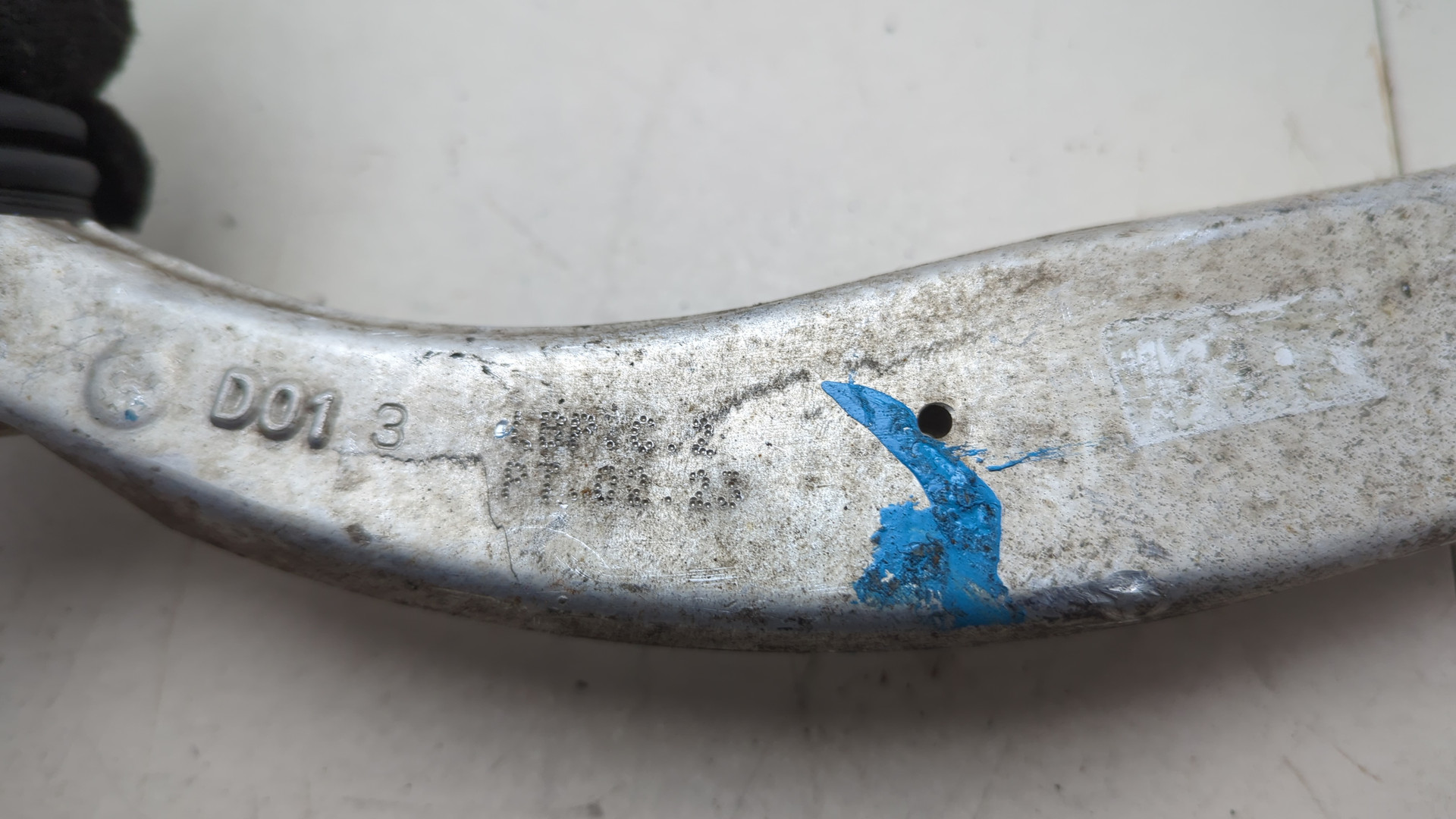 Рычаг передний левый