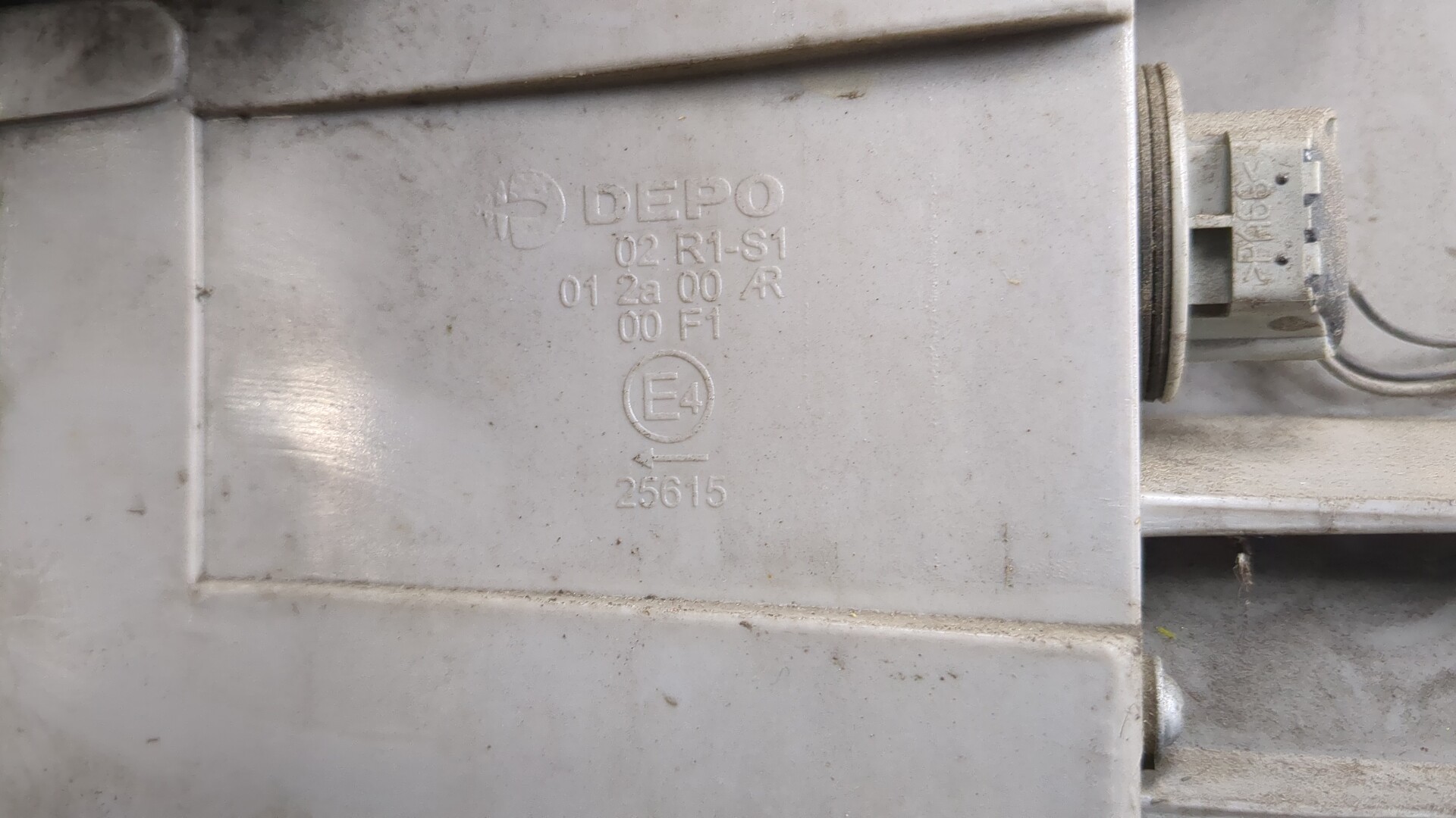 Фонарь задний левый