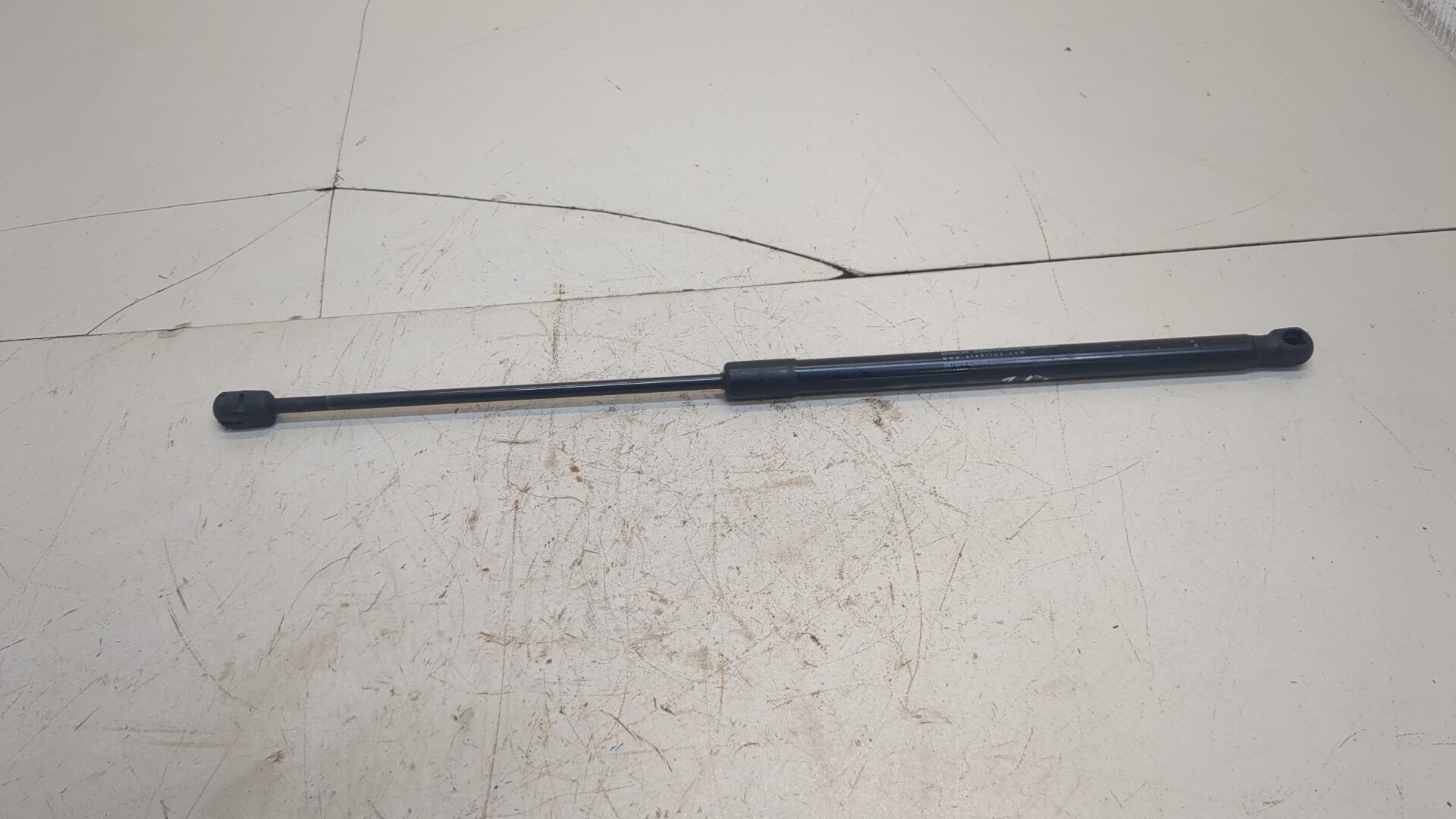 Амортизатор капота