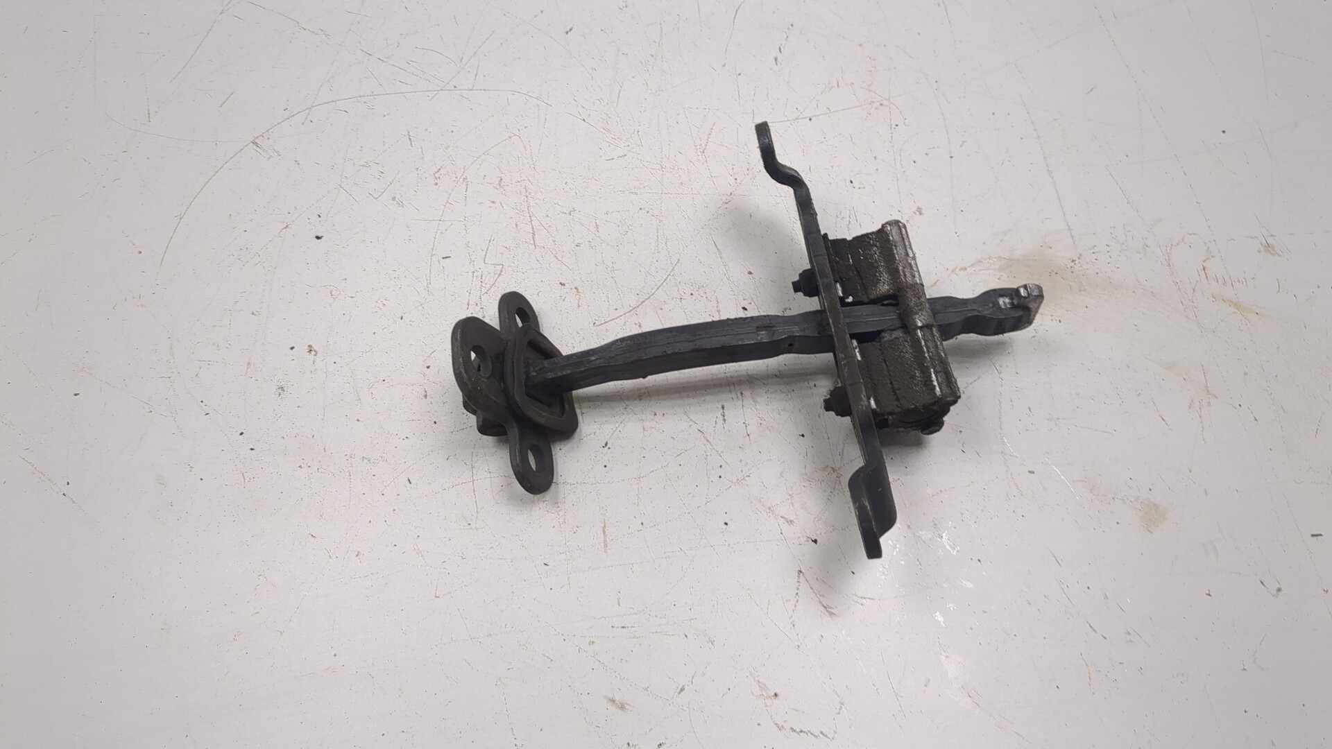 Ограничитель двери