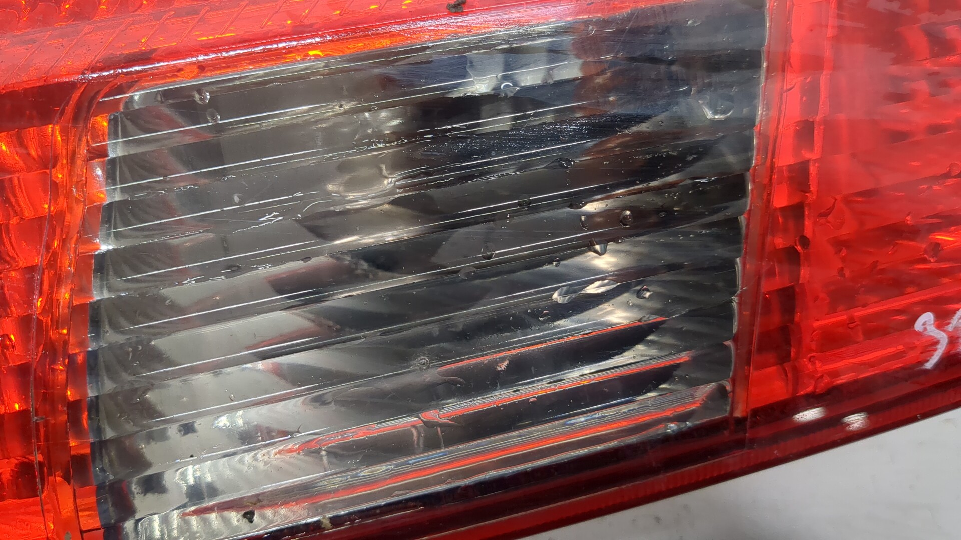 Фонарь задний левый