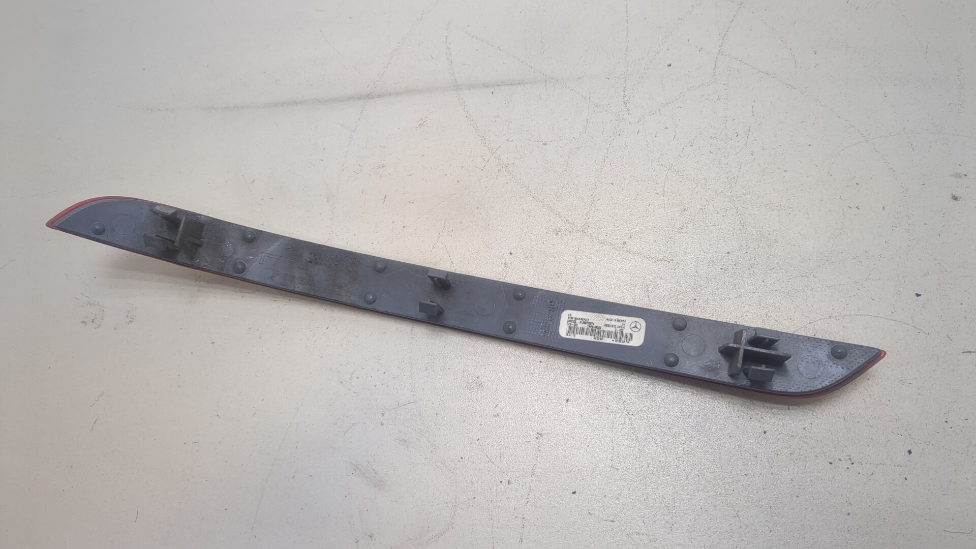 Отражатель в бампер задний левый