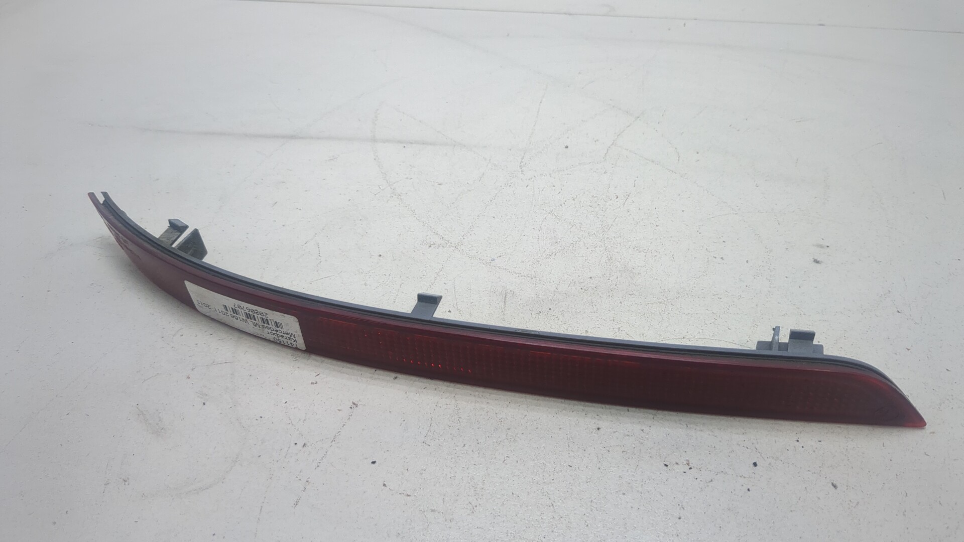 Отражатель в бампер задний левый