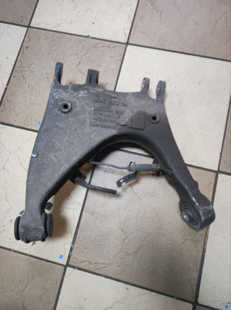 Рычаг задний левый