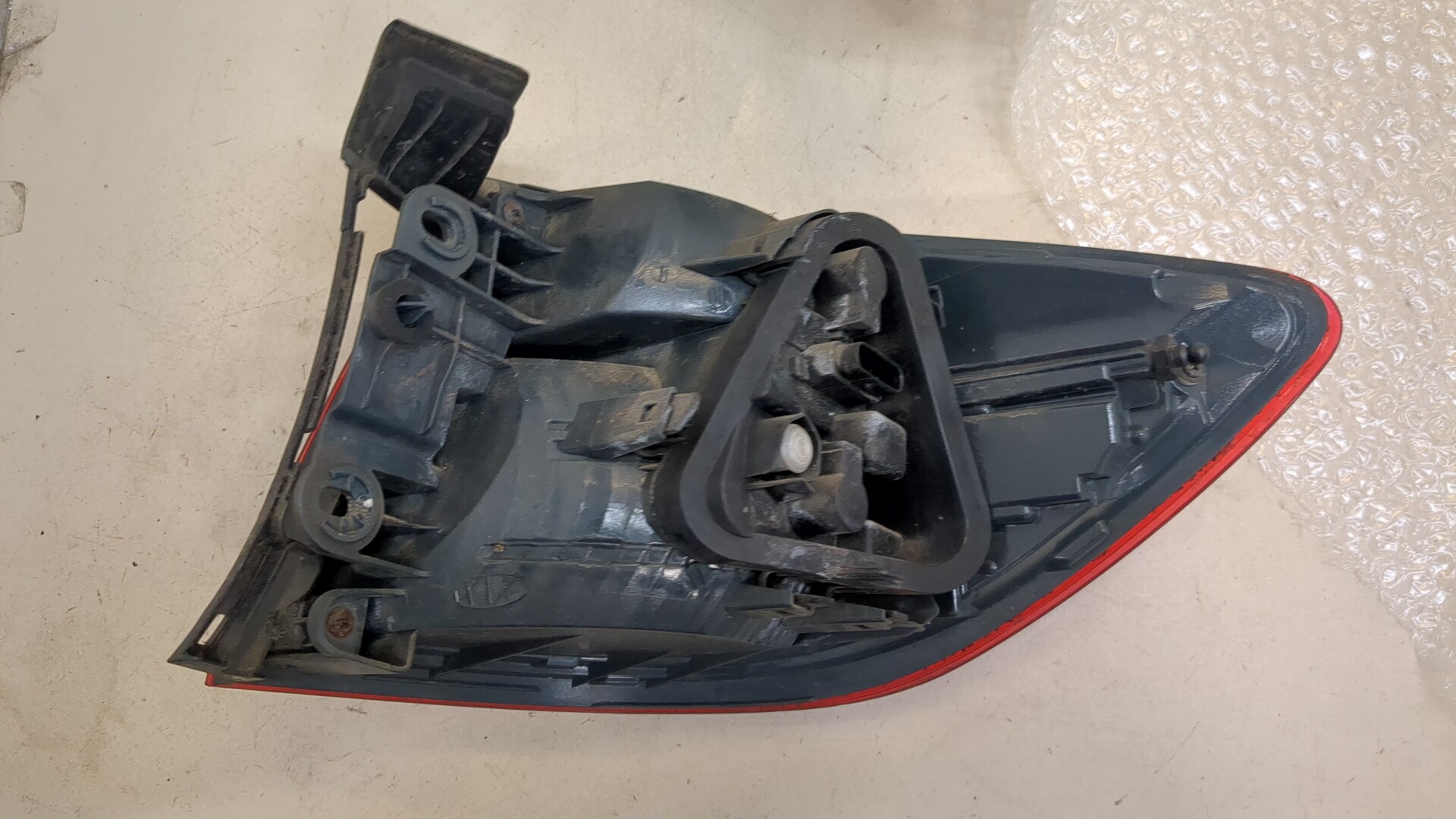 Фонарь задний левый