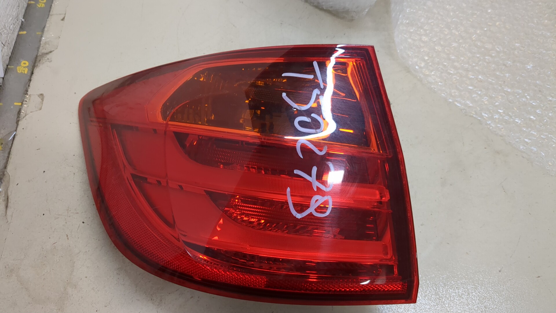 Фонарь задний левый