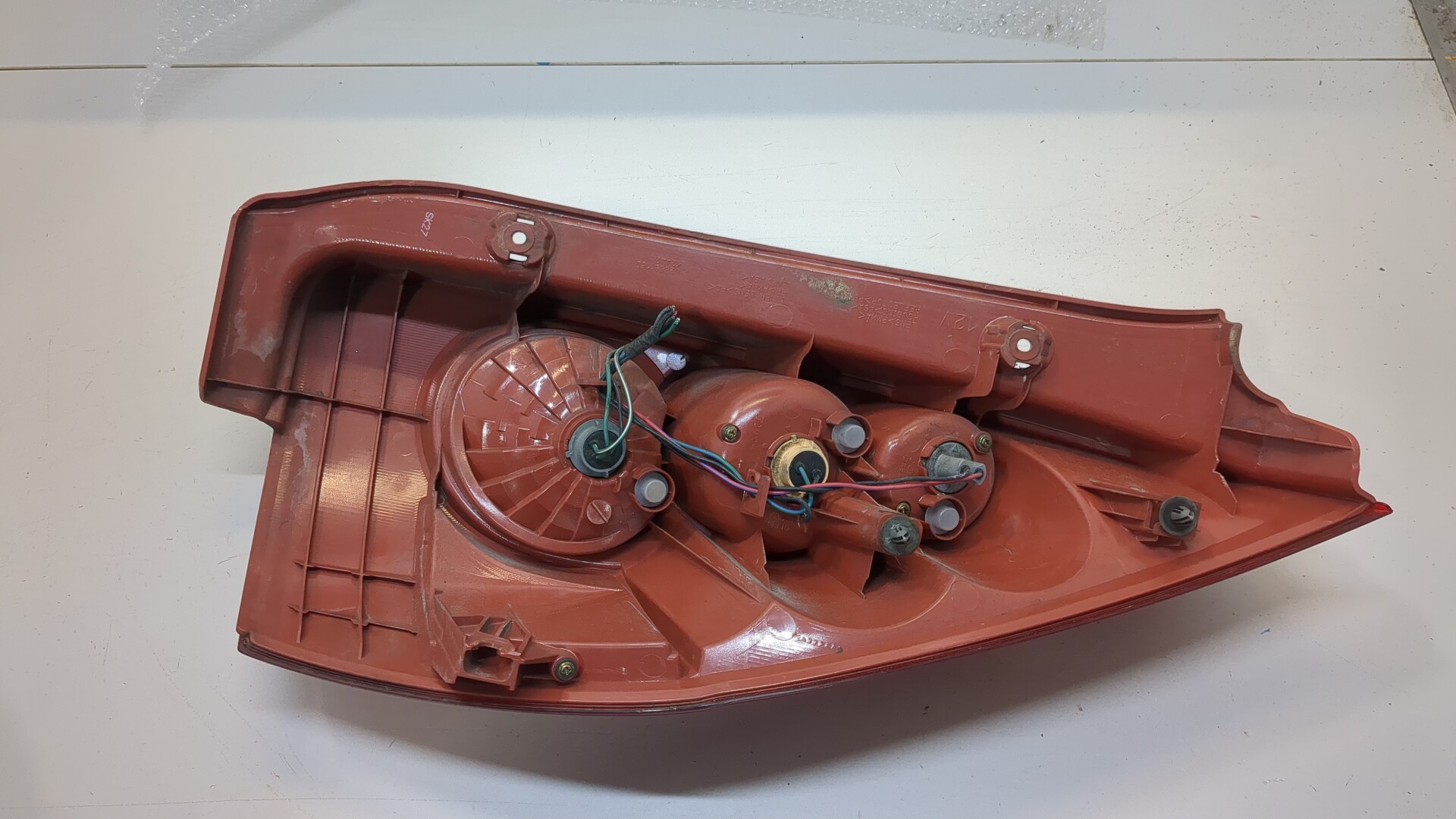 Фонарь задний левый