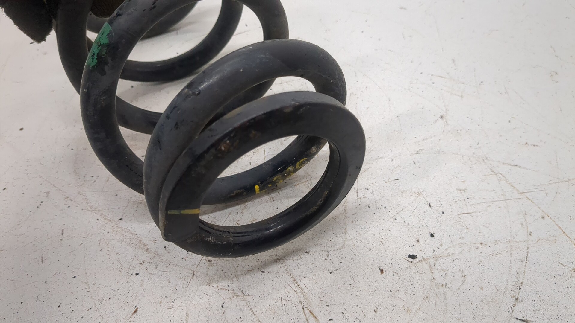 Пружина задняя