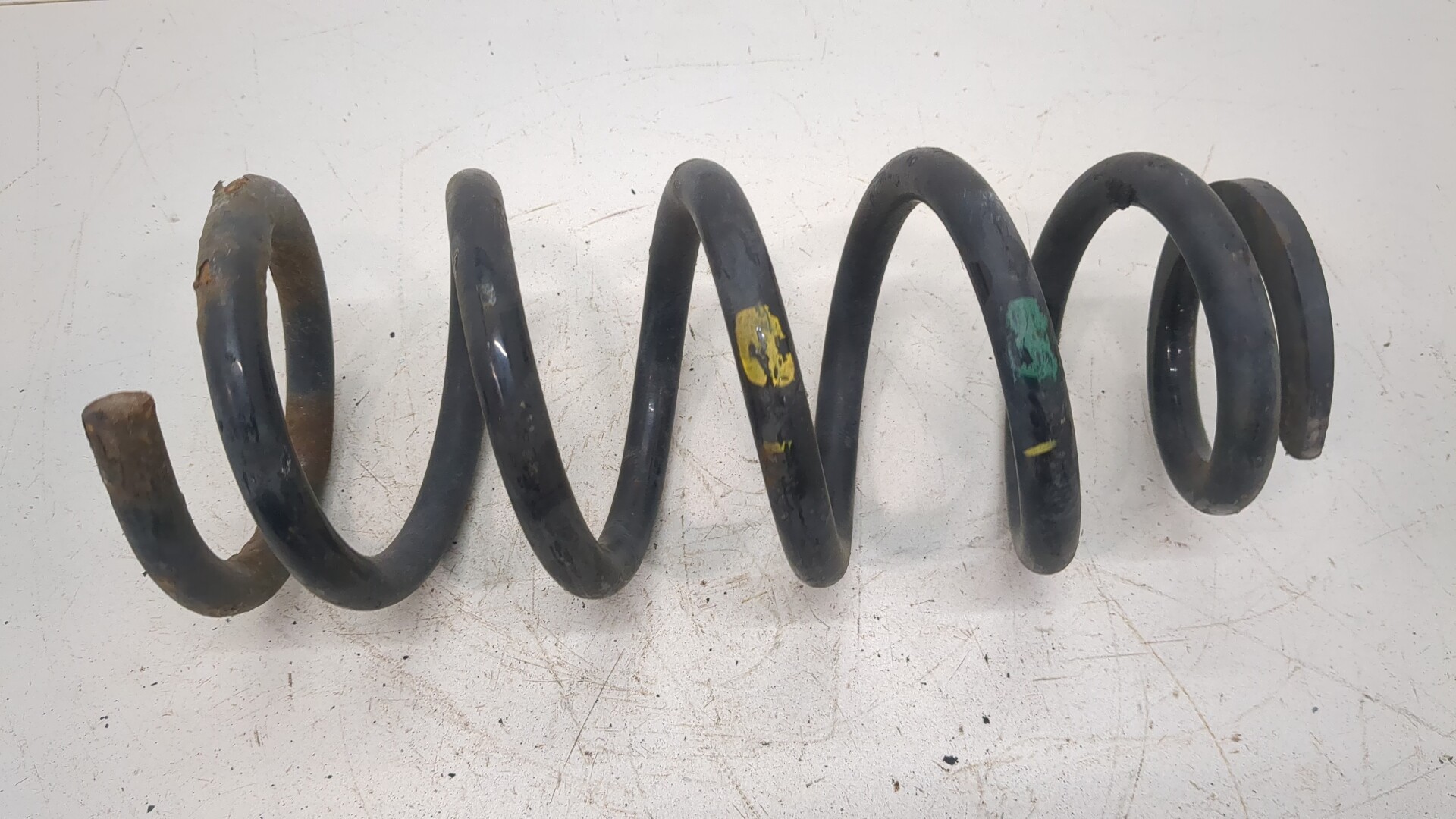 Пружина задняя