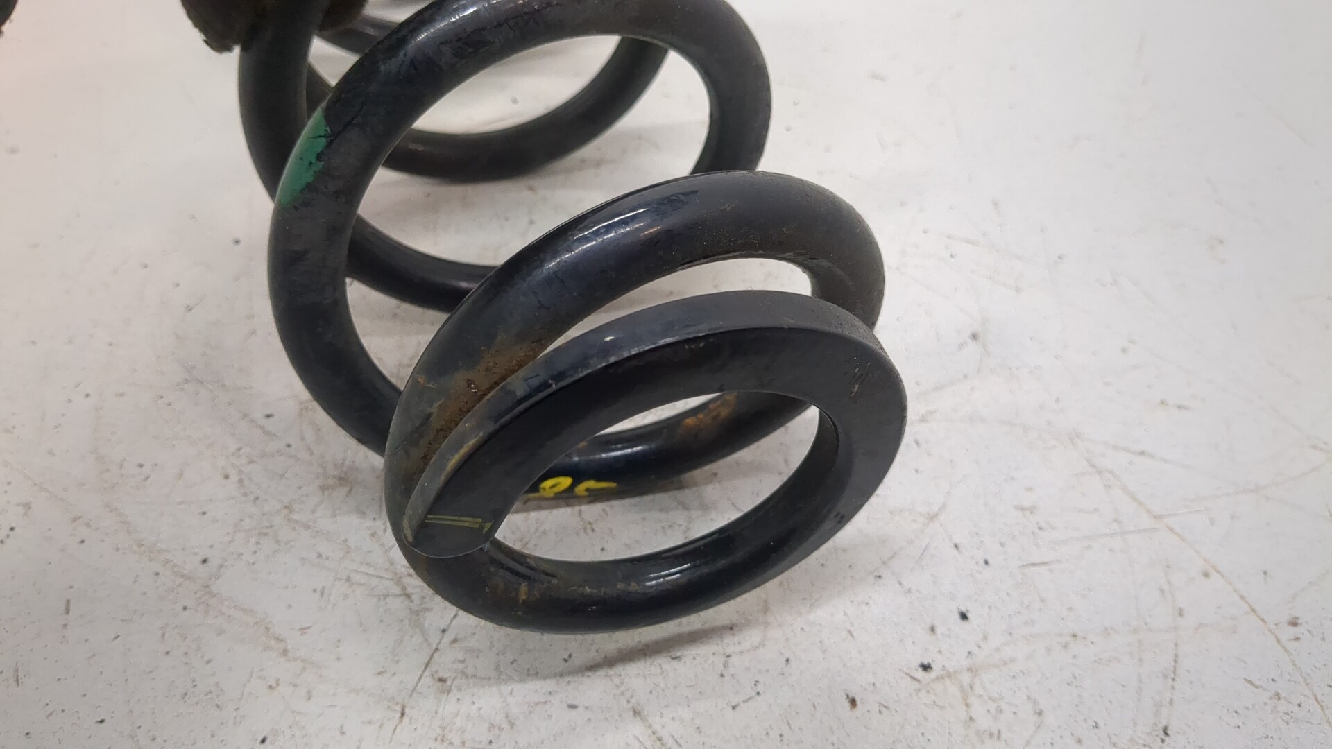 Пружина задняя