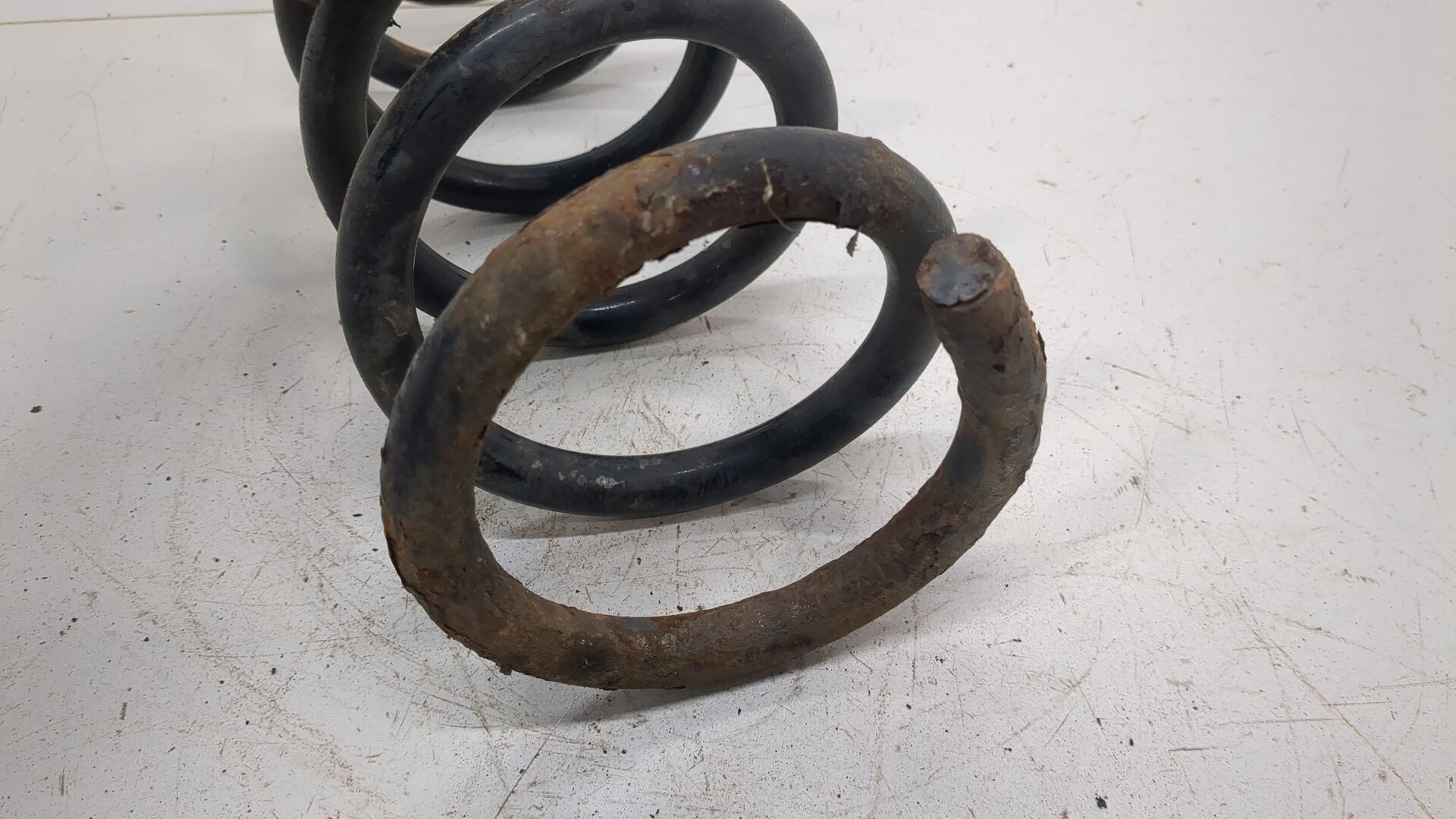 Пружина задняя