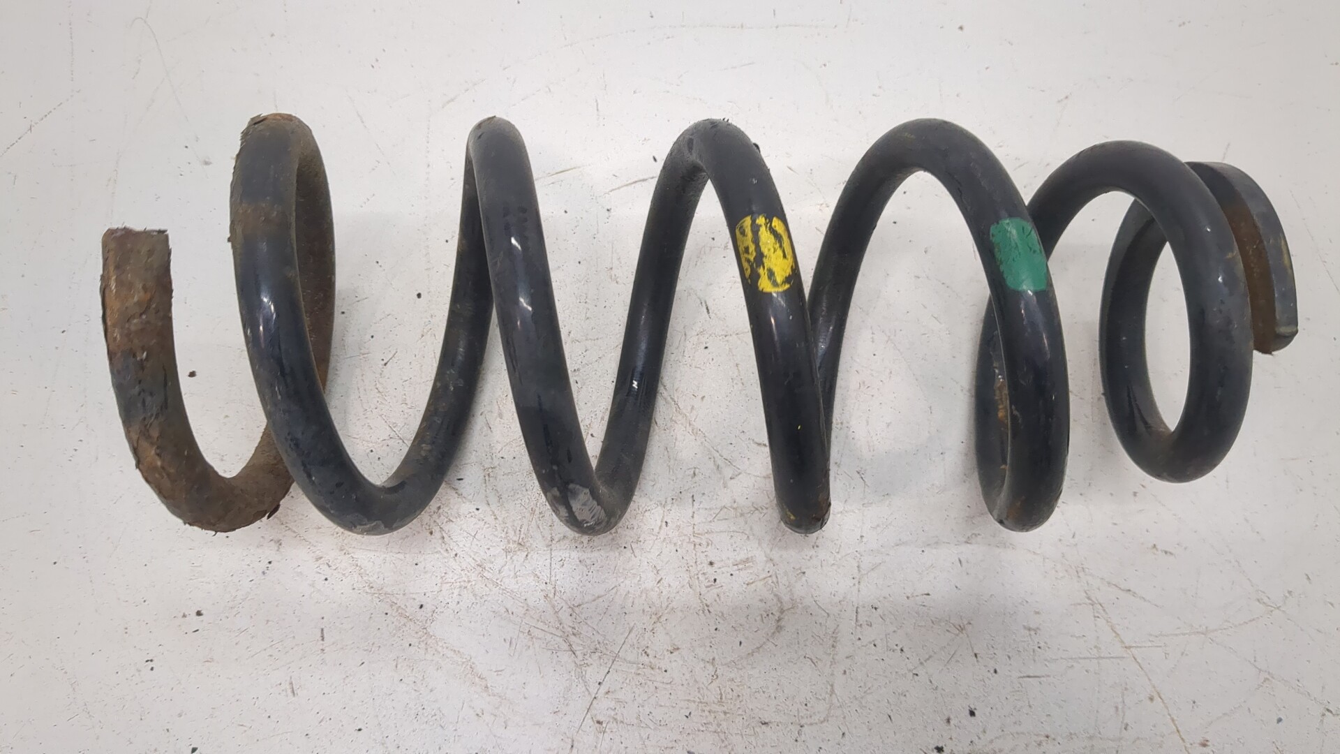 Пружина задняя