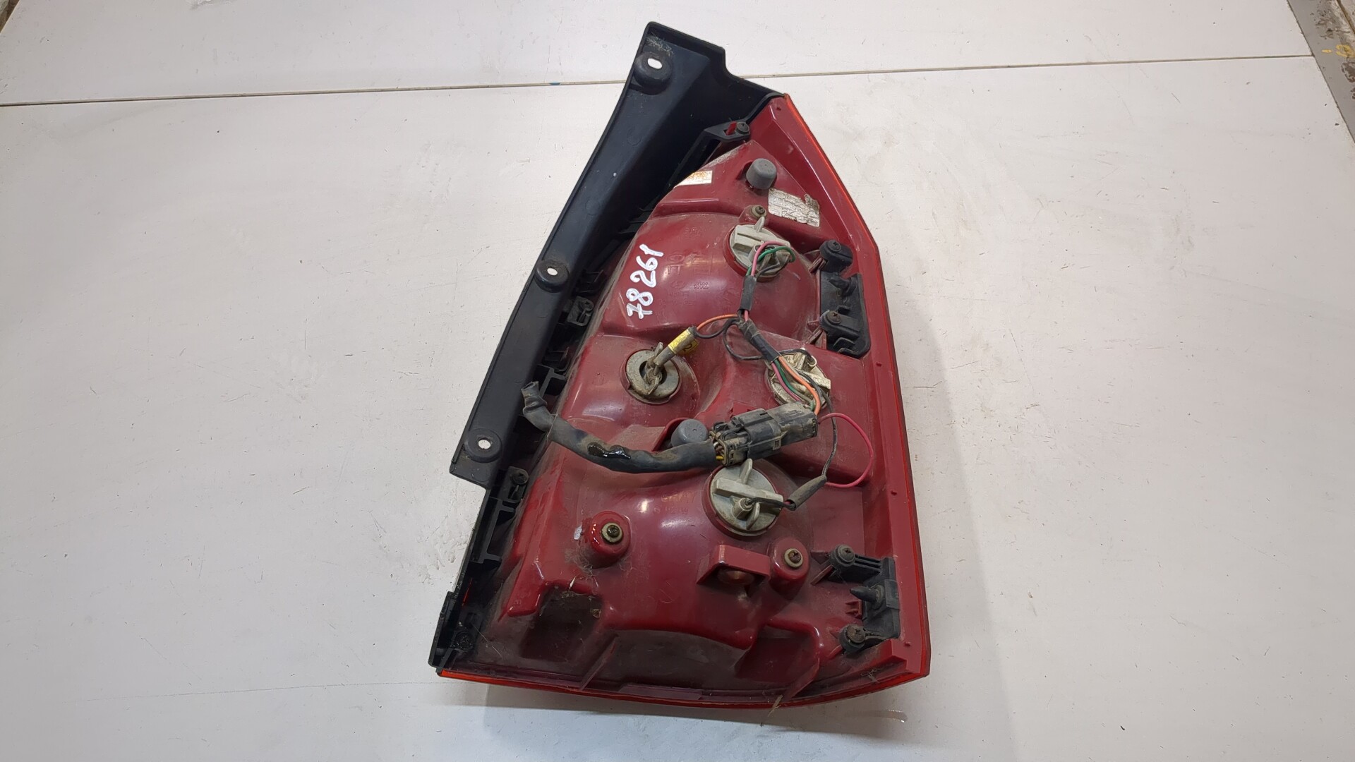 Фонарь задний левый