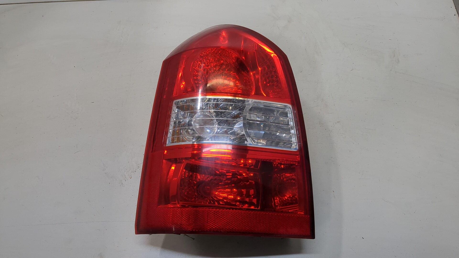 Фонарь задний левый