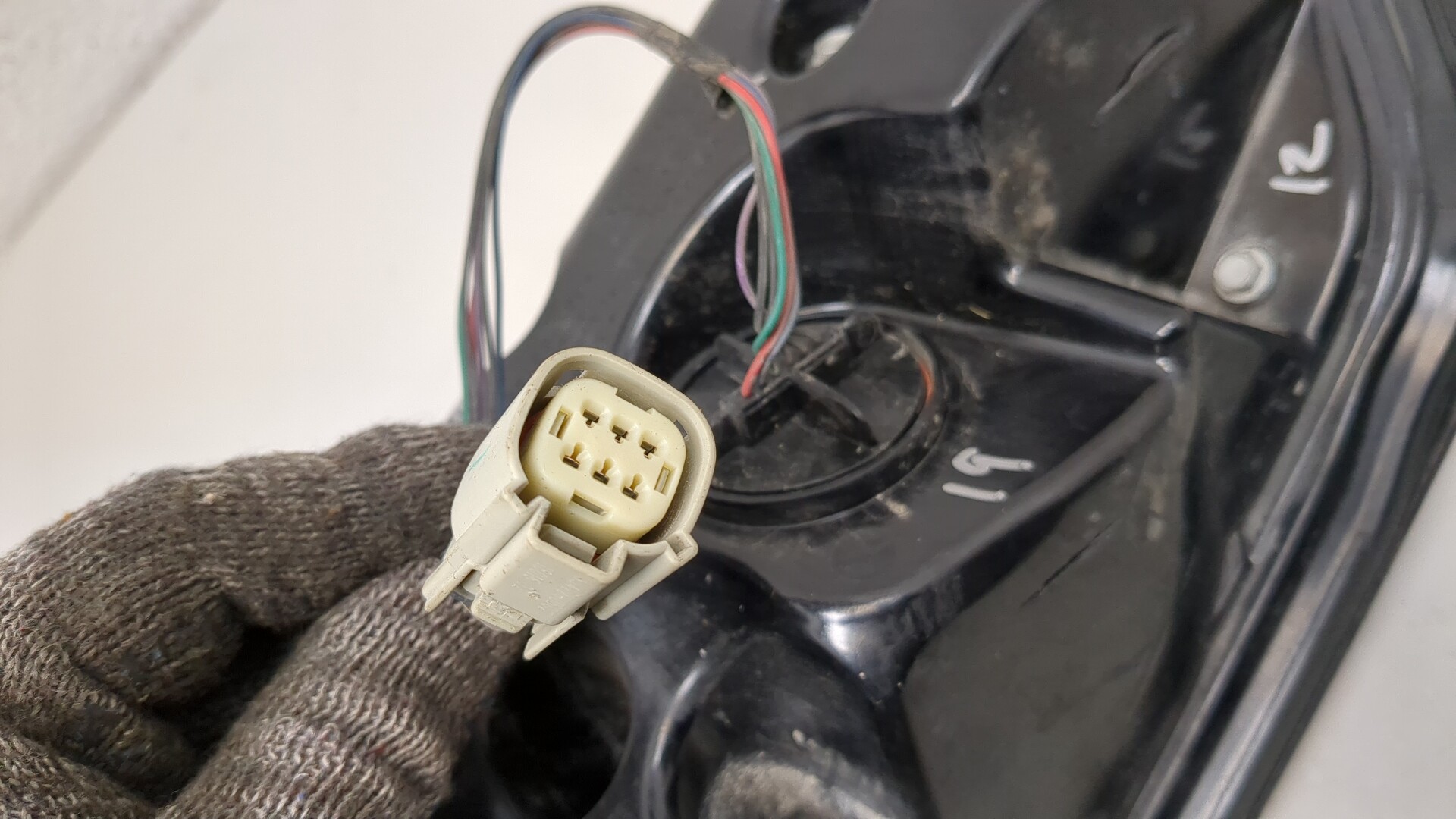 Фонарь задний левый