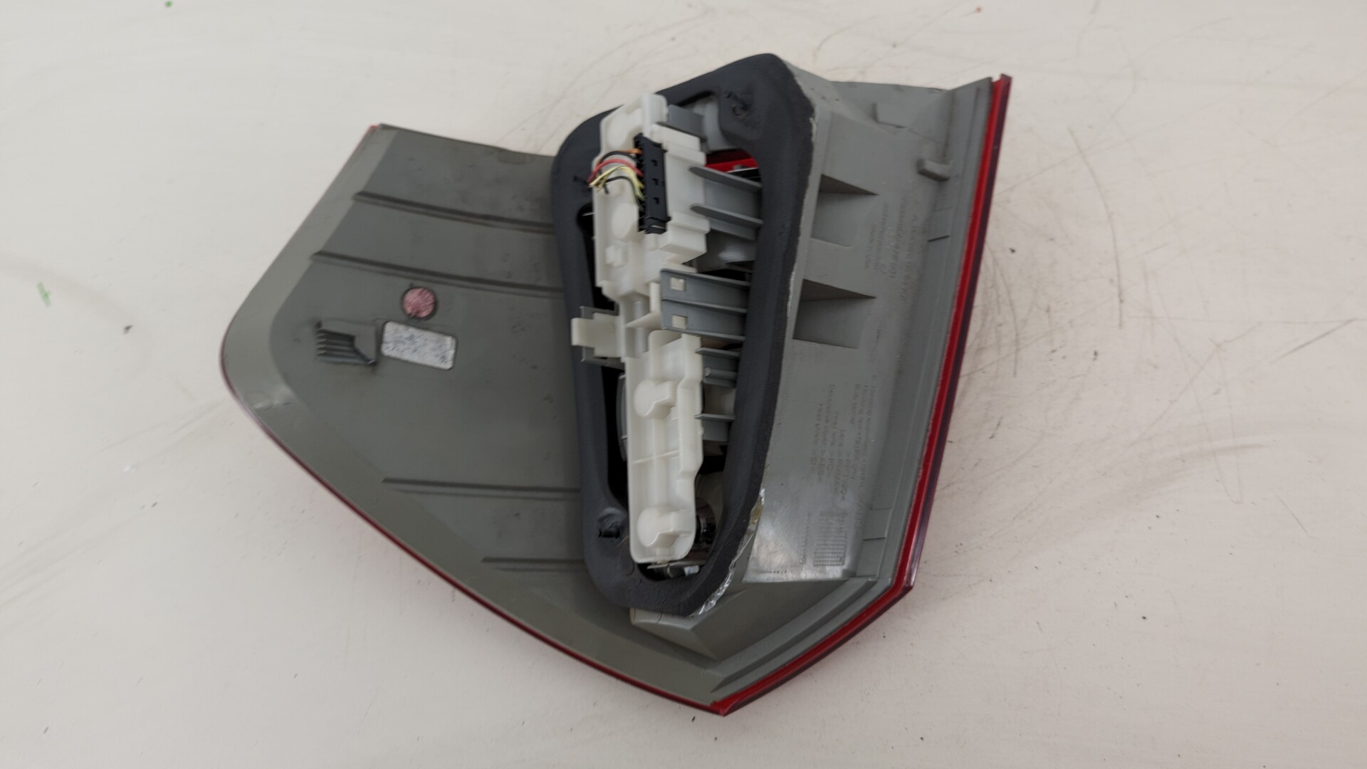 Фонарь задний левый