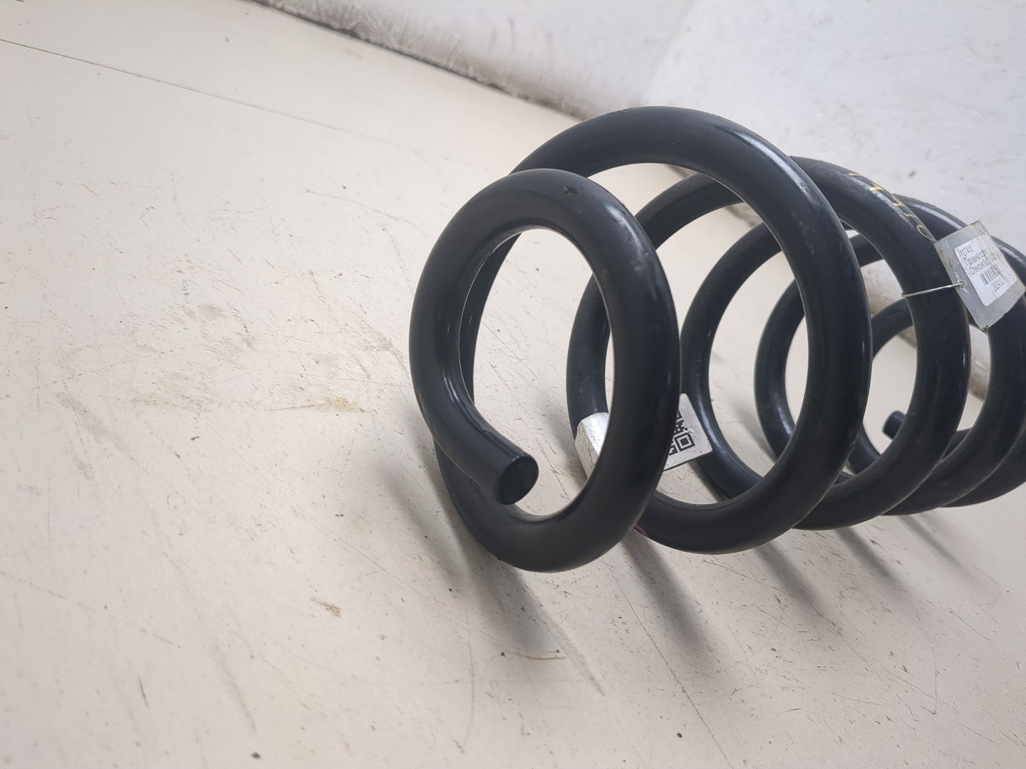 Пружина задняя