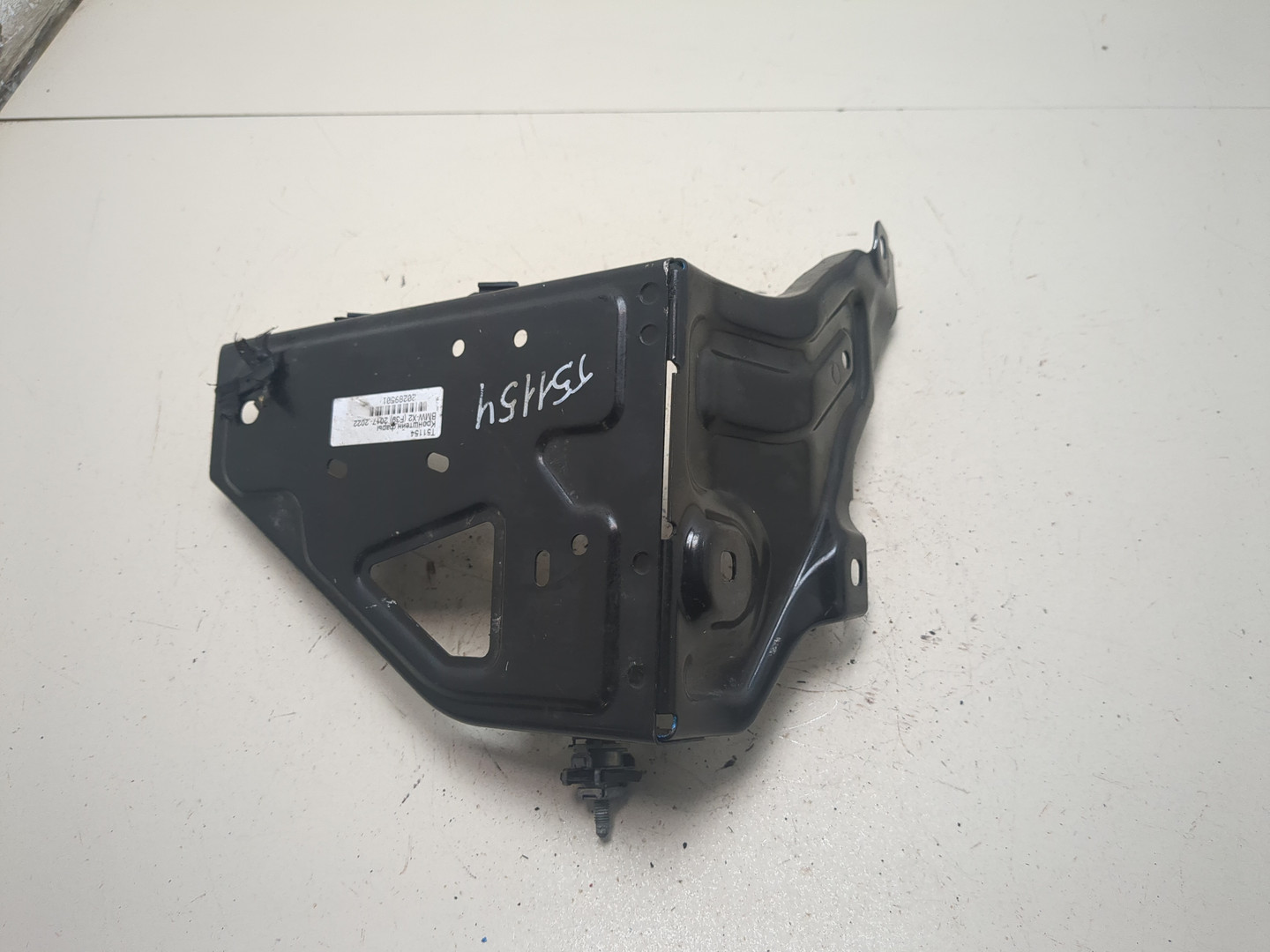 Кронштейн фар левый