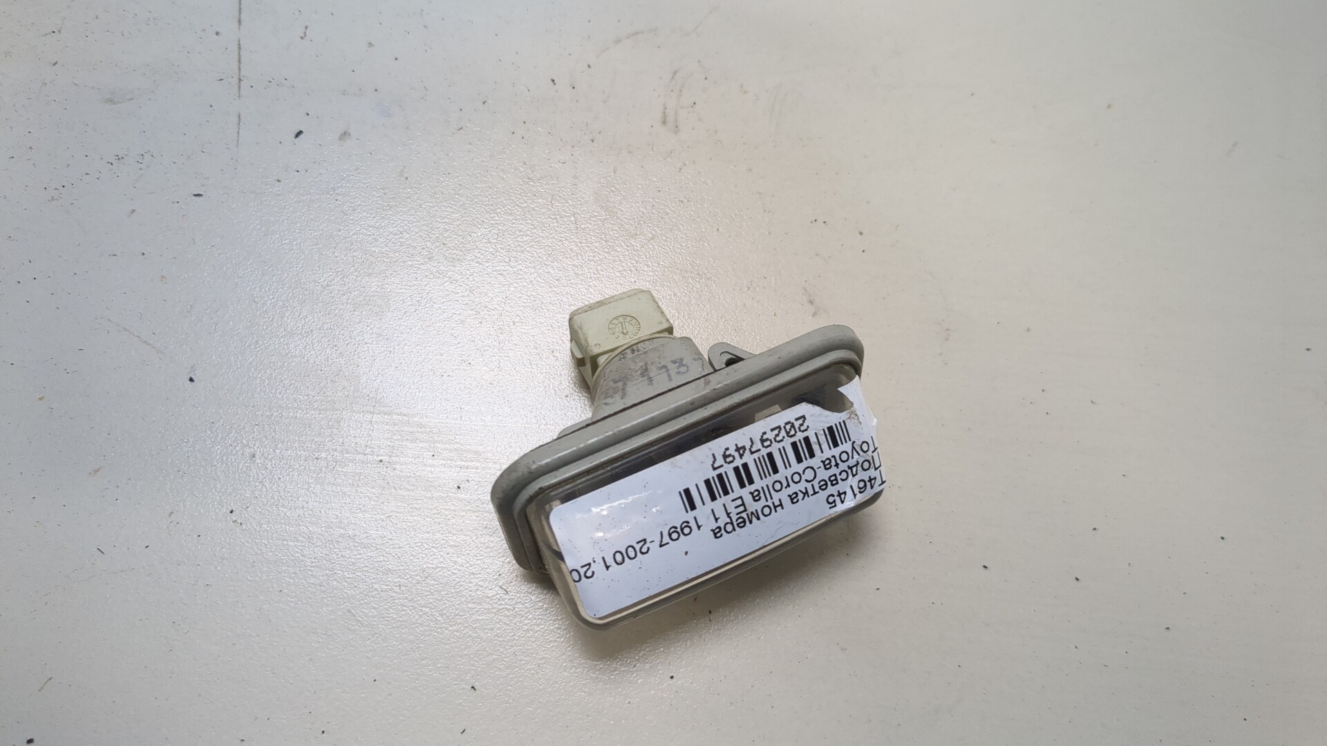 Фонарь подсветки номера