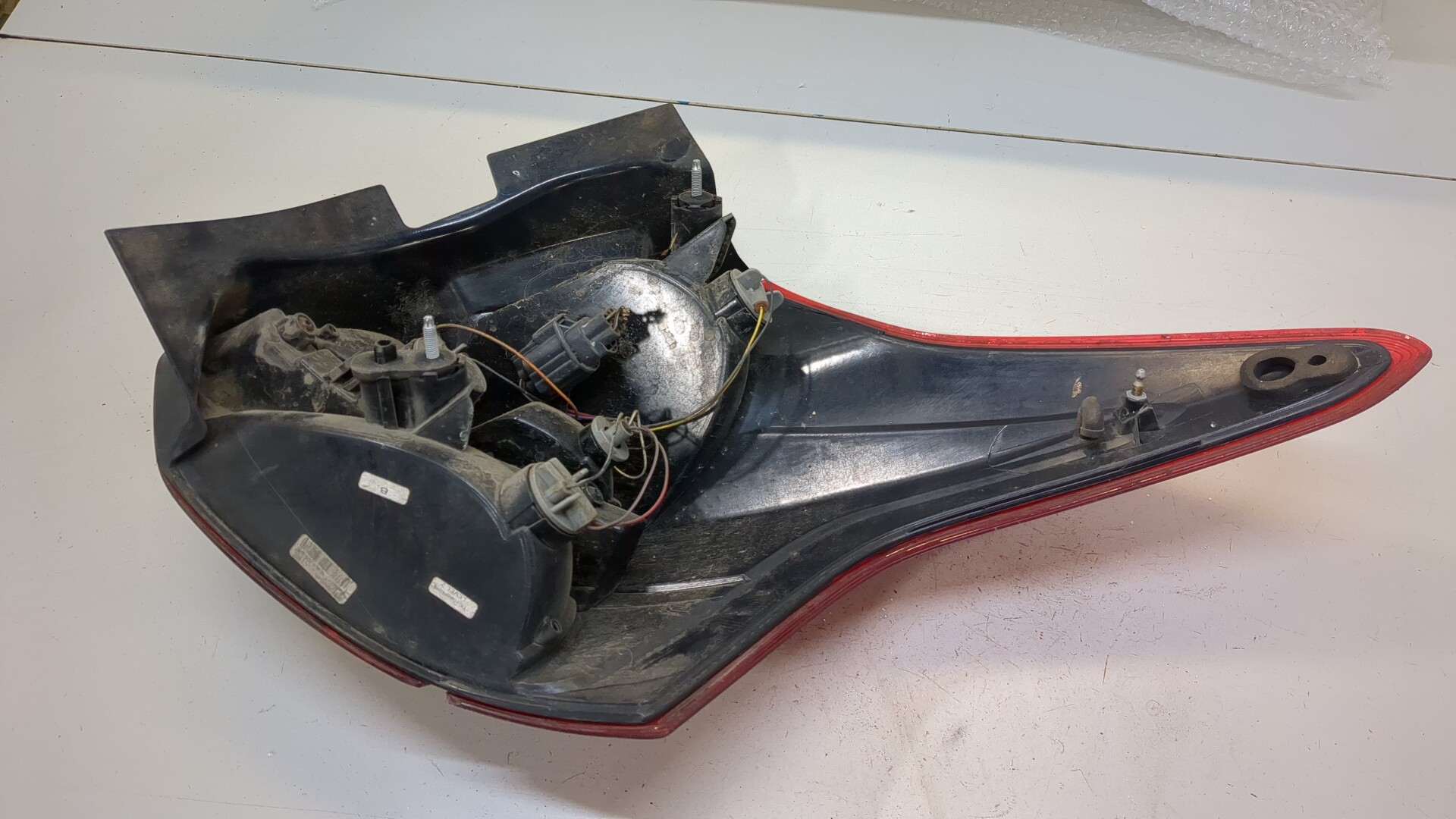 Фонарь задний левый