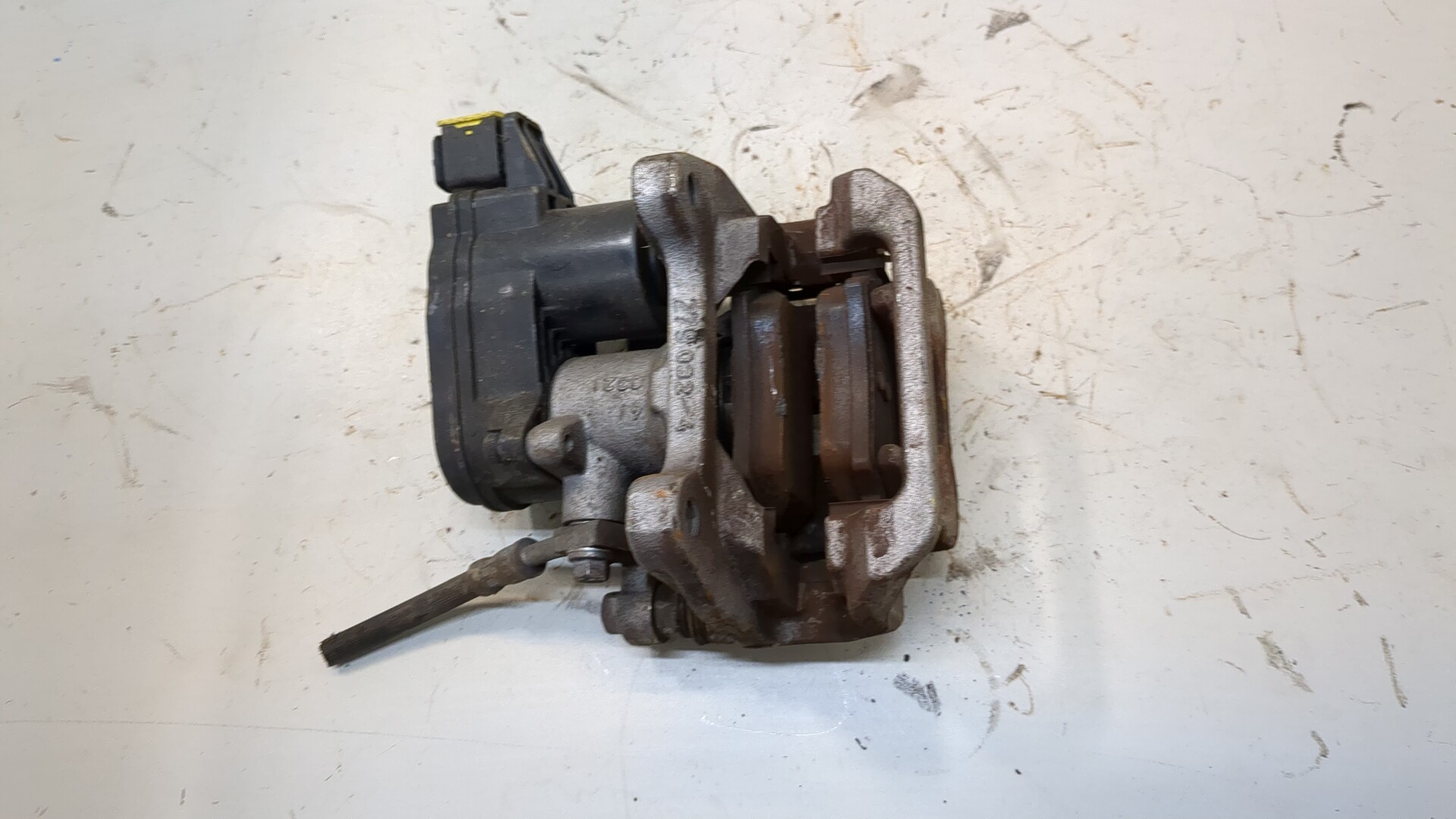 Суппорт задний левый