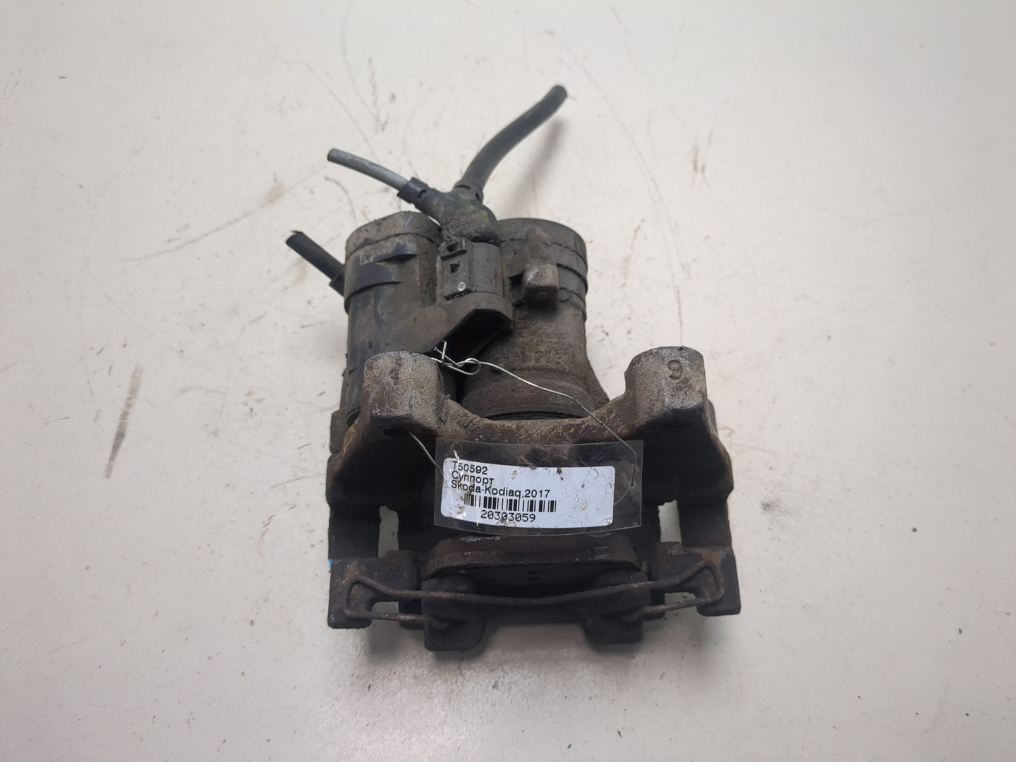 Суппорт задний левый