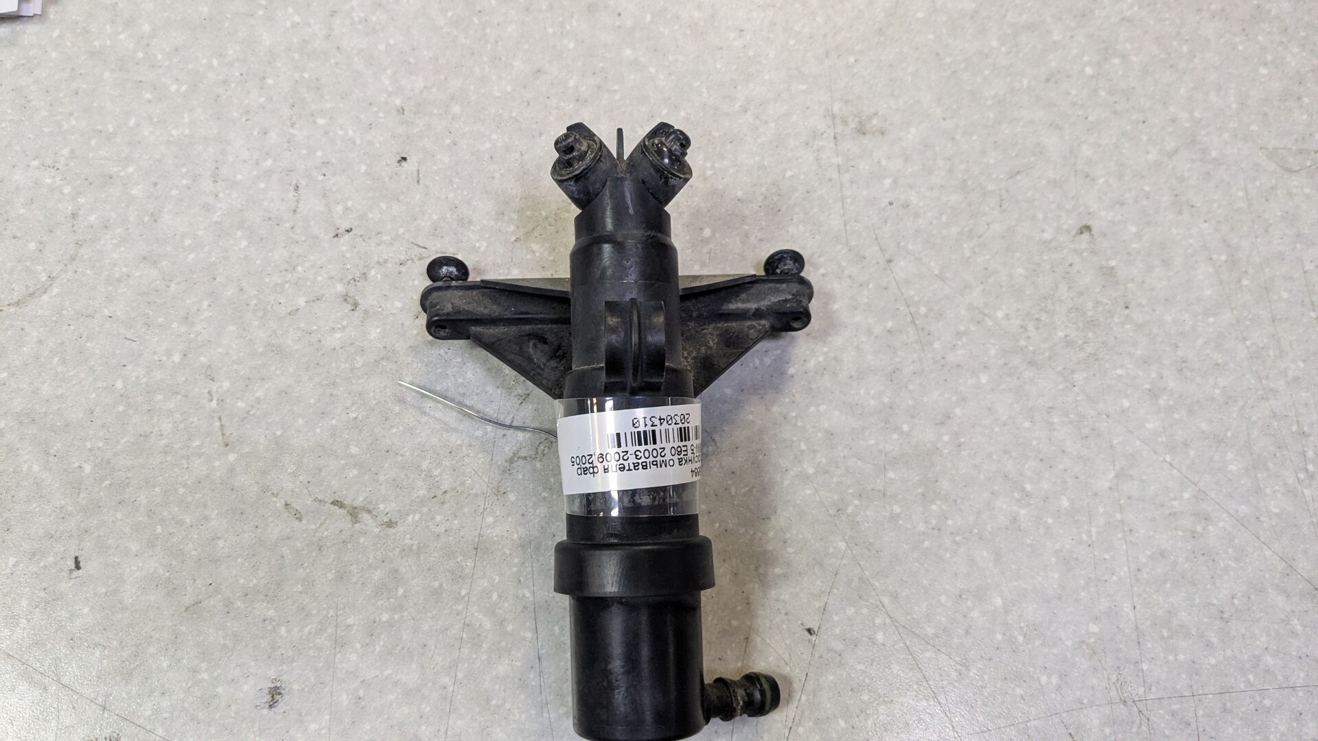 Форсунка омывателя фары