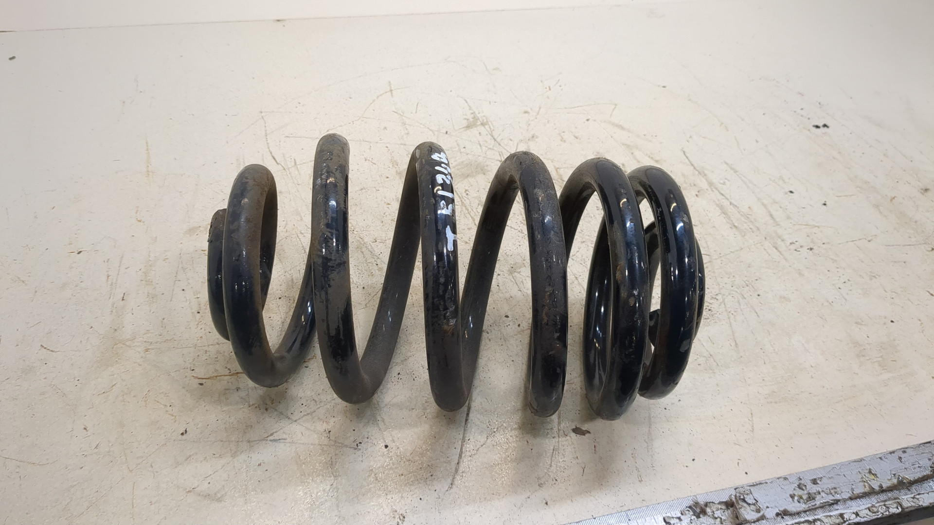 Пружина задняя