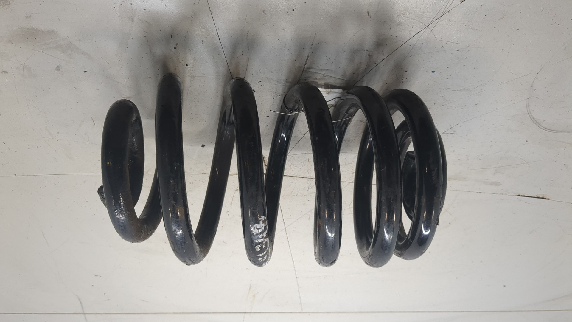 Пружина задняя