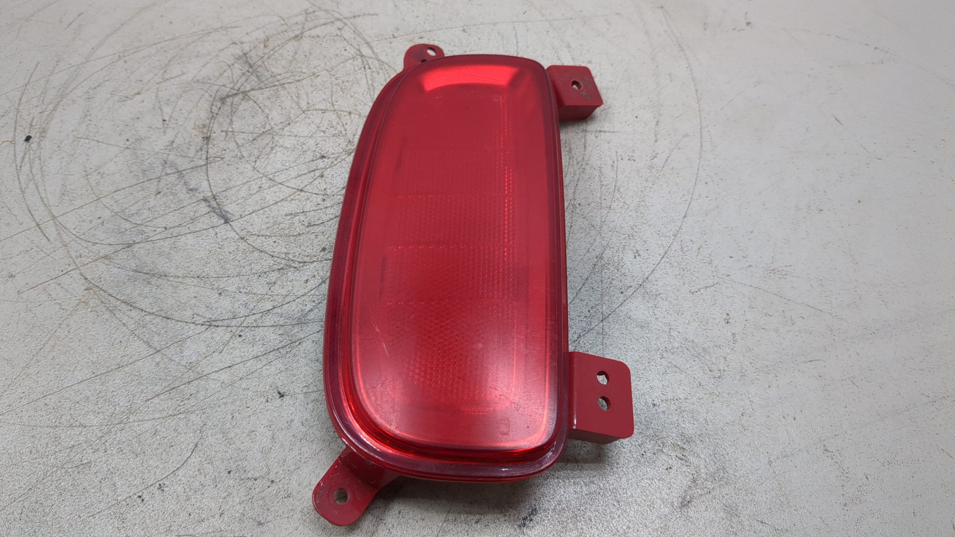 Отражатель в бампер задний левый