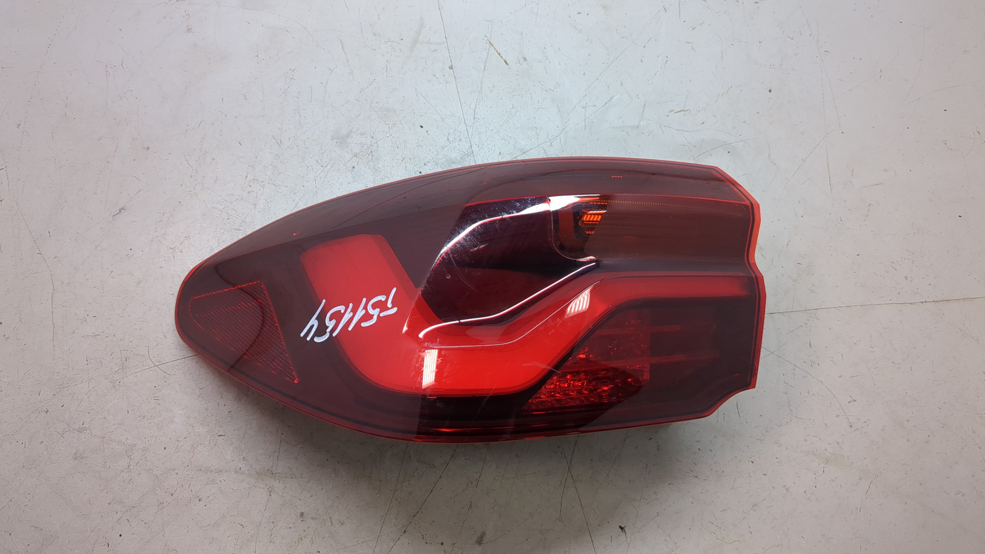 Фонарь задний левый