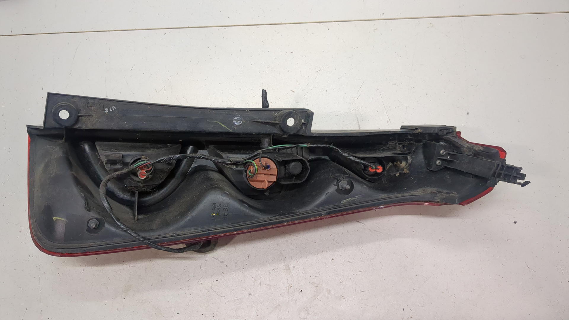 Фонарь задний левый