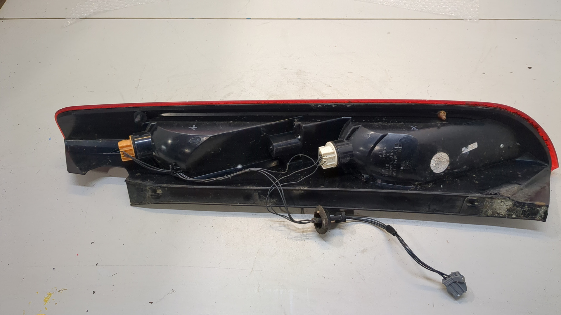 Фонарь задний левый