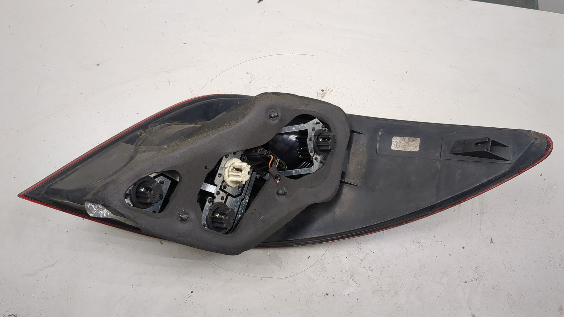 Фонарь задний левый