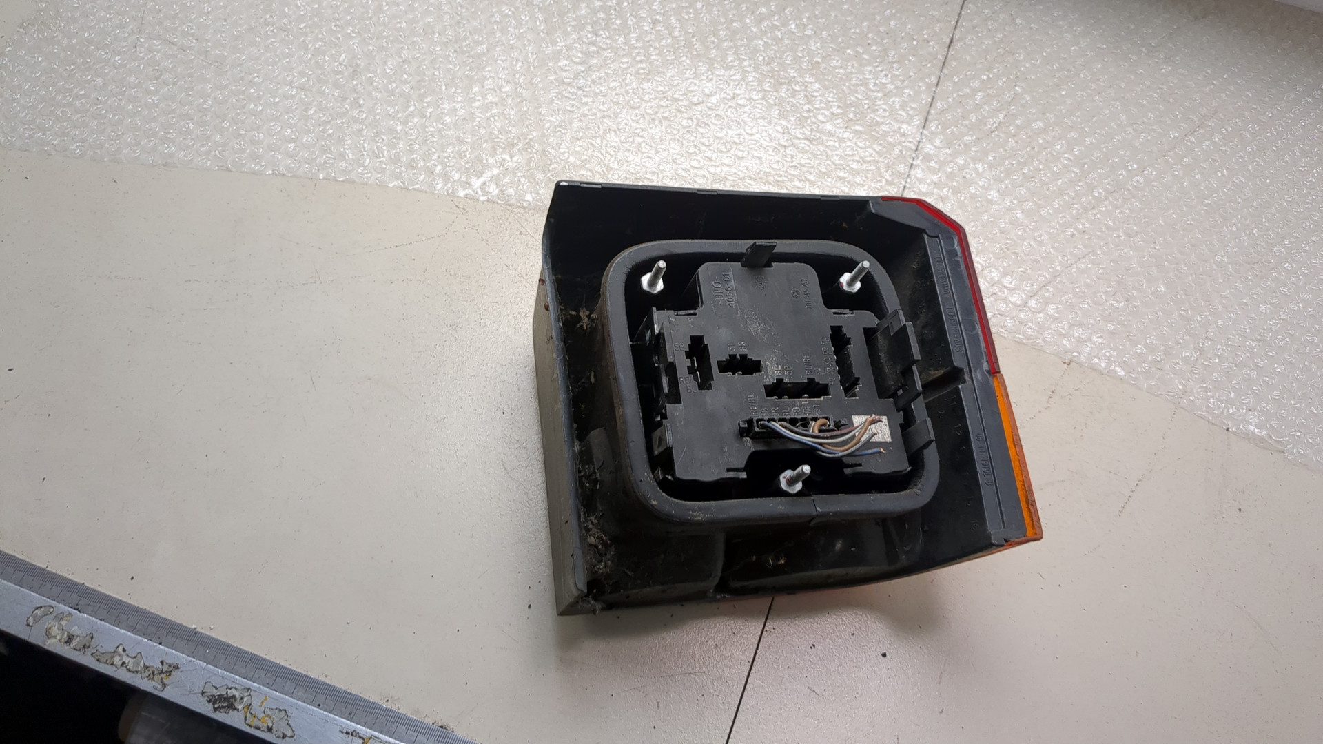 Фонарь задний левый