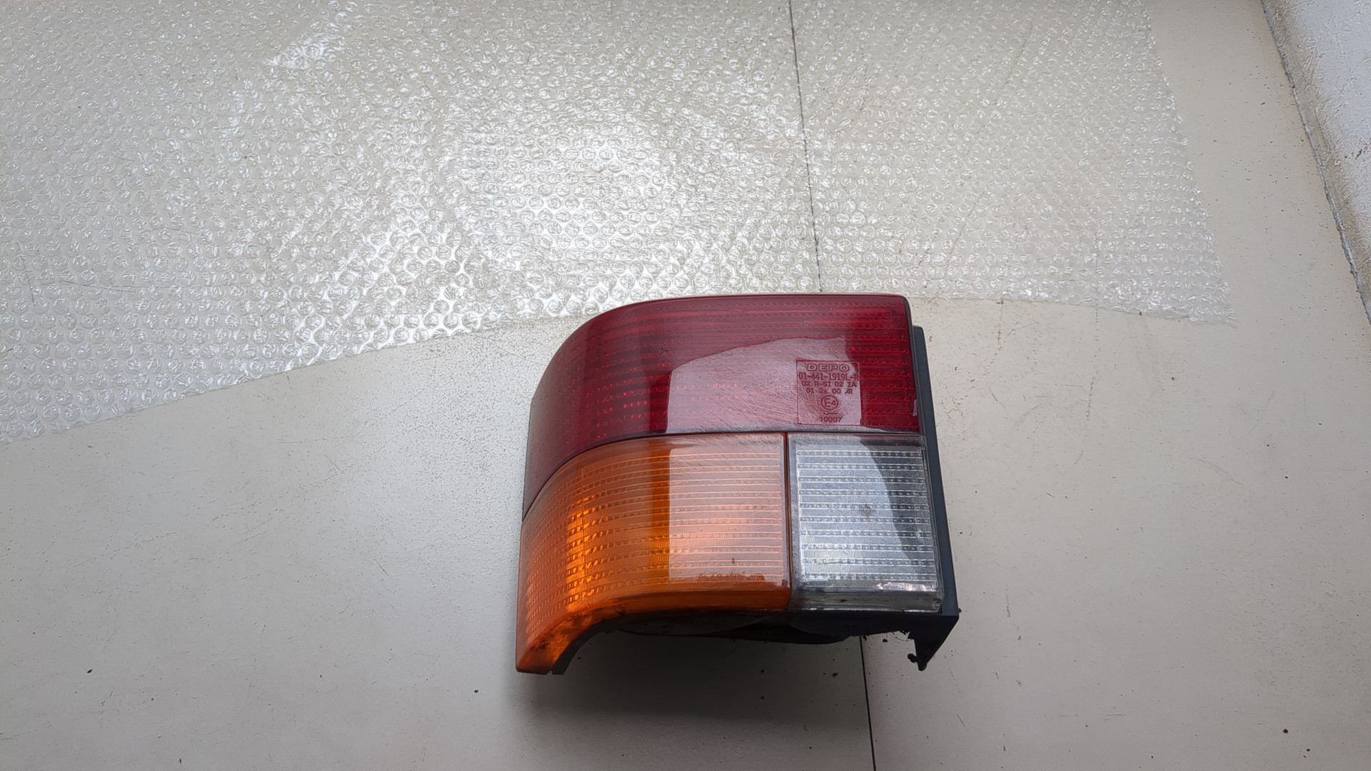 Фонарь задний левый