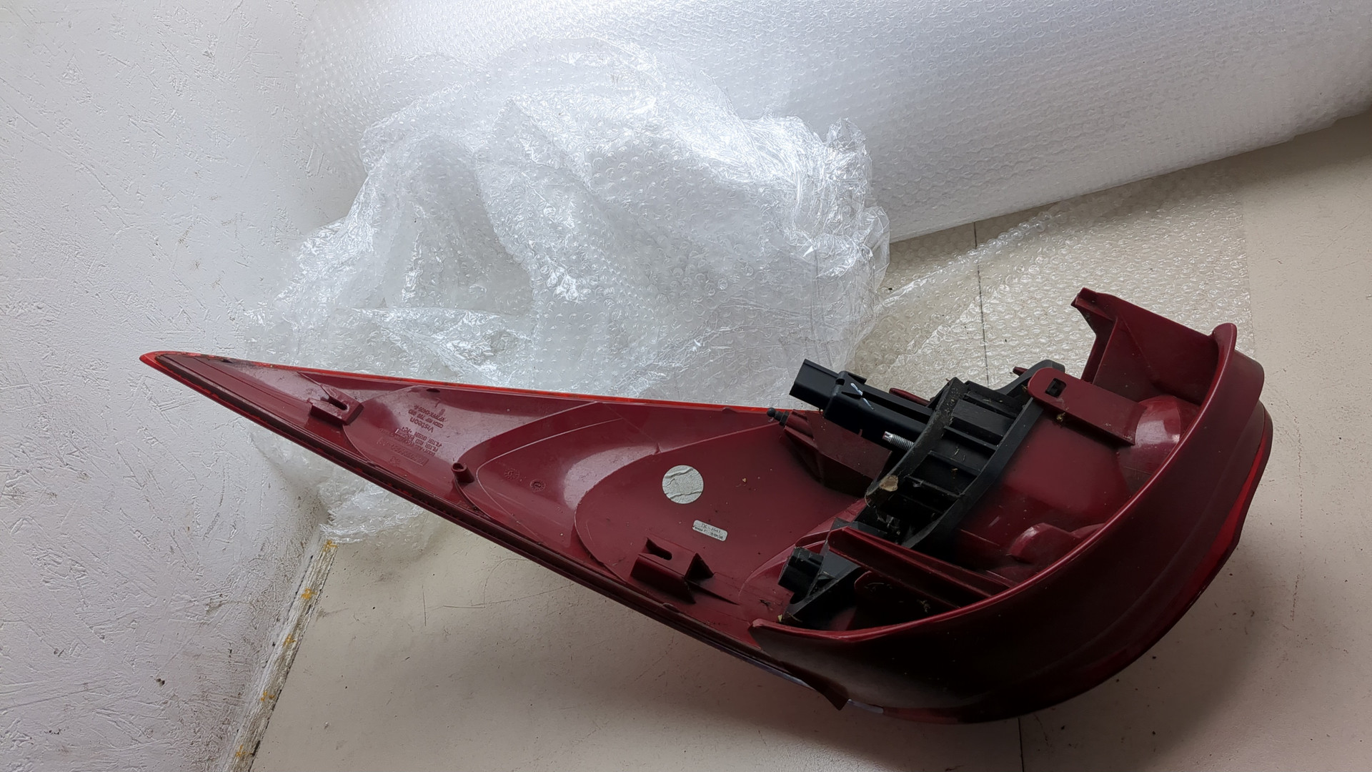 Фонарь задний левый