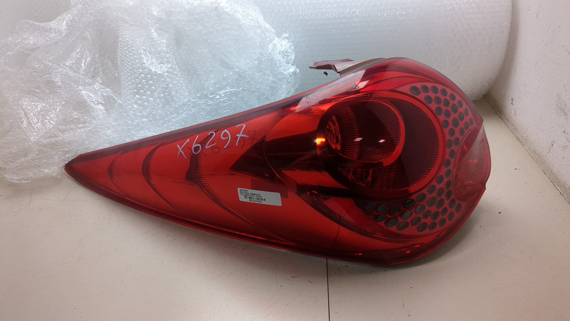 Фонарь задний левый