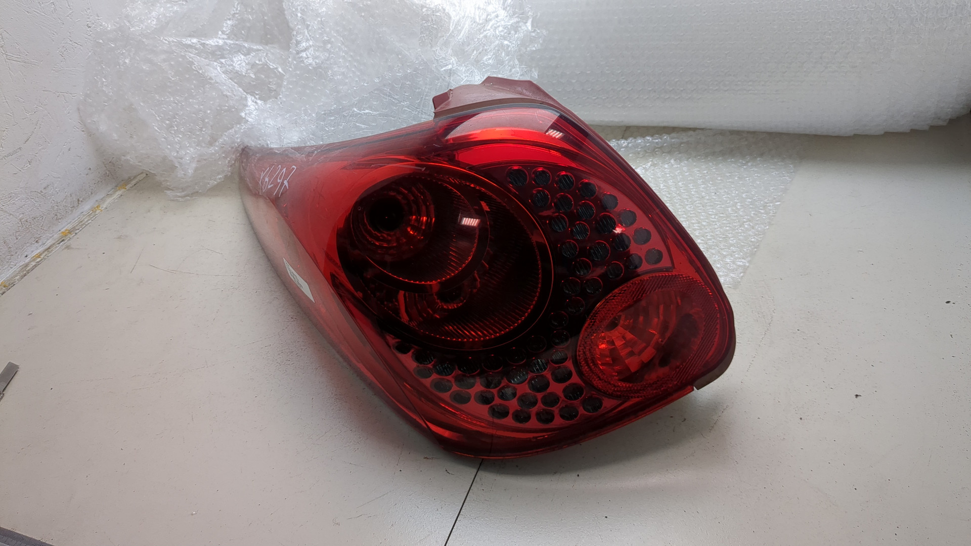 Фонарь задний левый