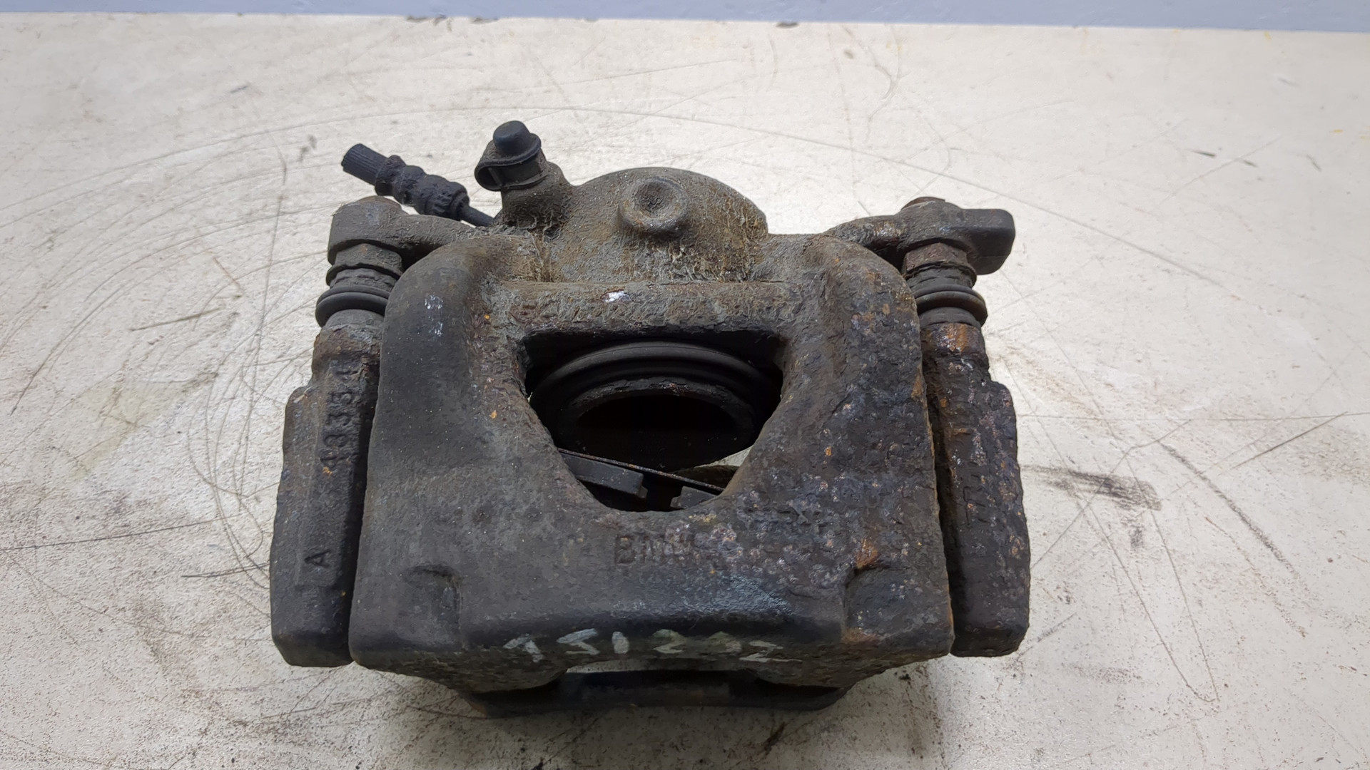 Суппорт передний левый