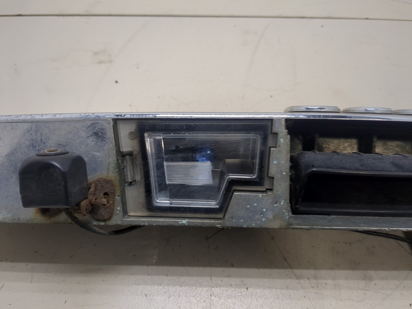 Фонарь подсветки номера