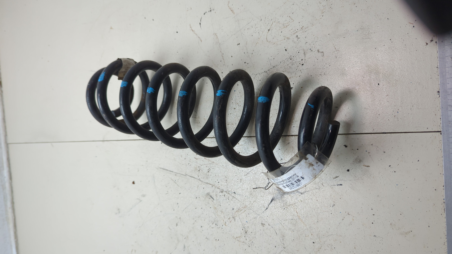 Пружина задняя