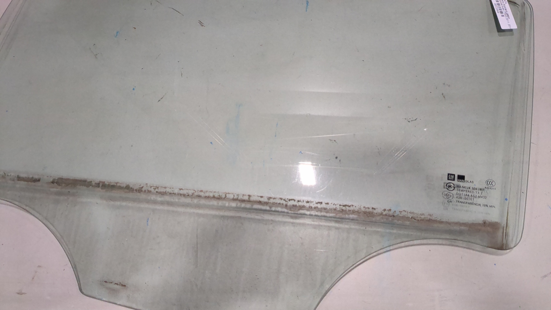 Стекло двери задней левой