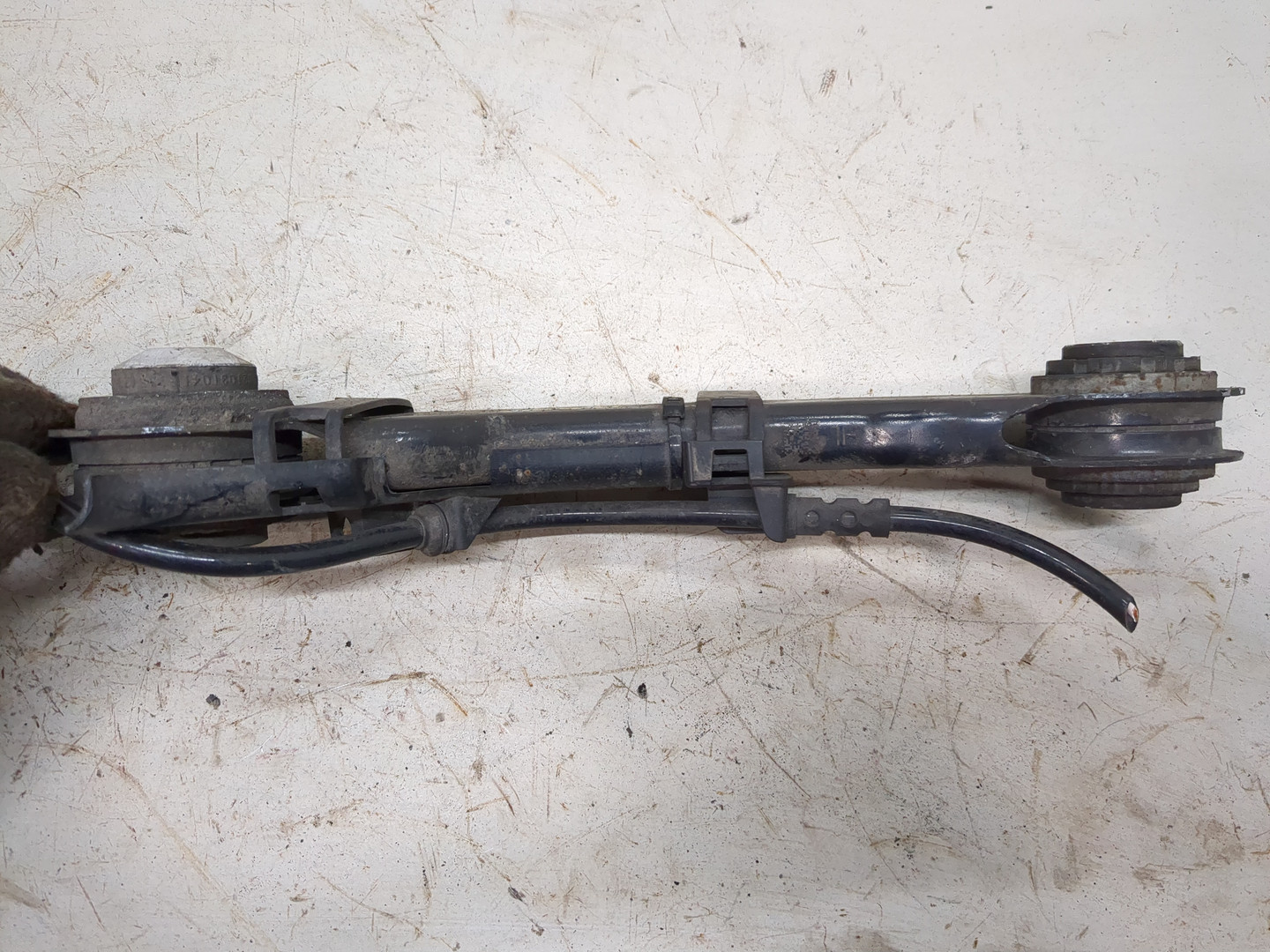 Рычаг задний левый